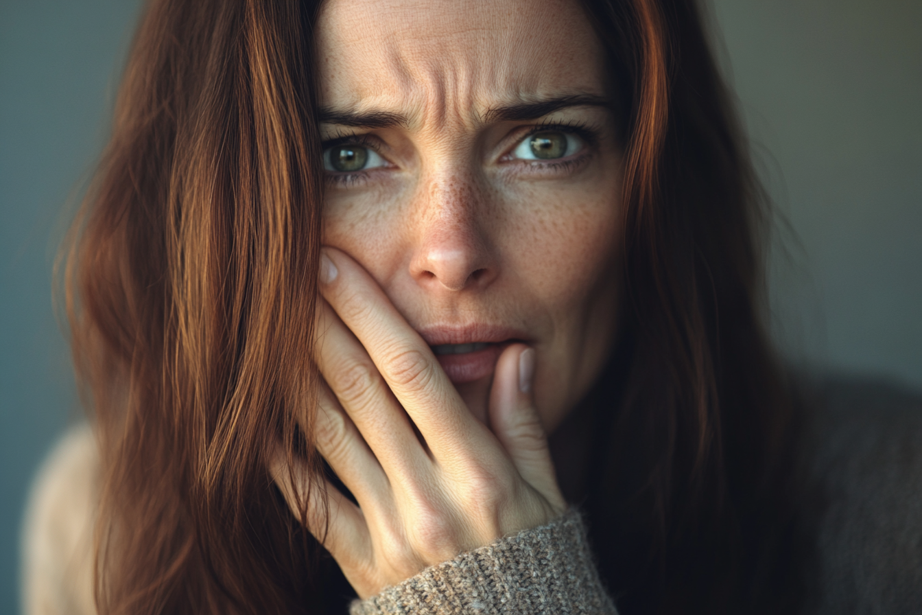 A woman gasping in shock | Source: No source