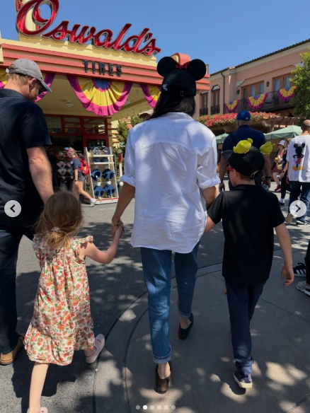 Meghan Markle and Prince Harry walked through Disneyland with Prince Archie and Princess Lilibet during a family celebration honoring the children's birthdays in Anaheim, California, in a post shared May 12, 2026. | Source: Instagram/meghan
