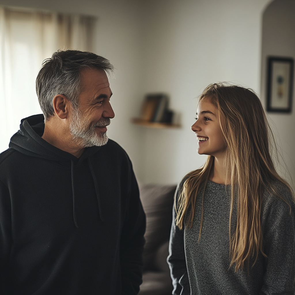 A man talking to his daughter | Source: No source