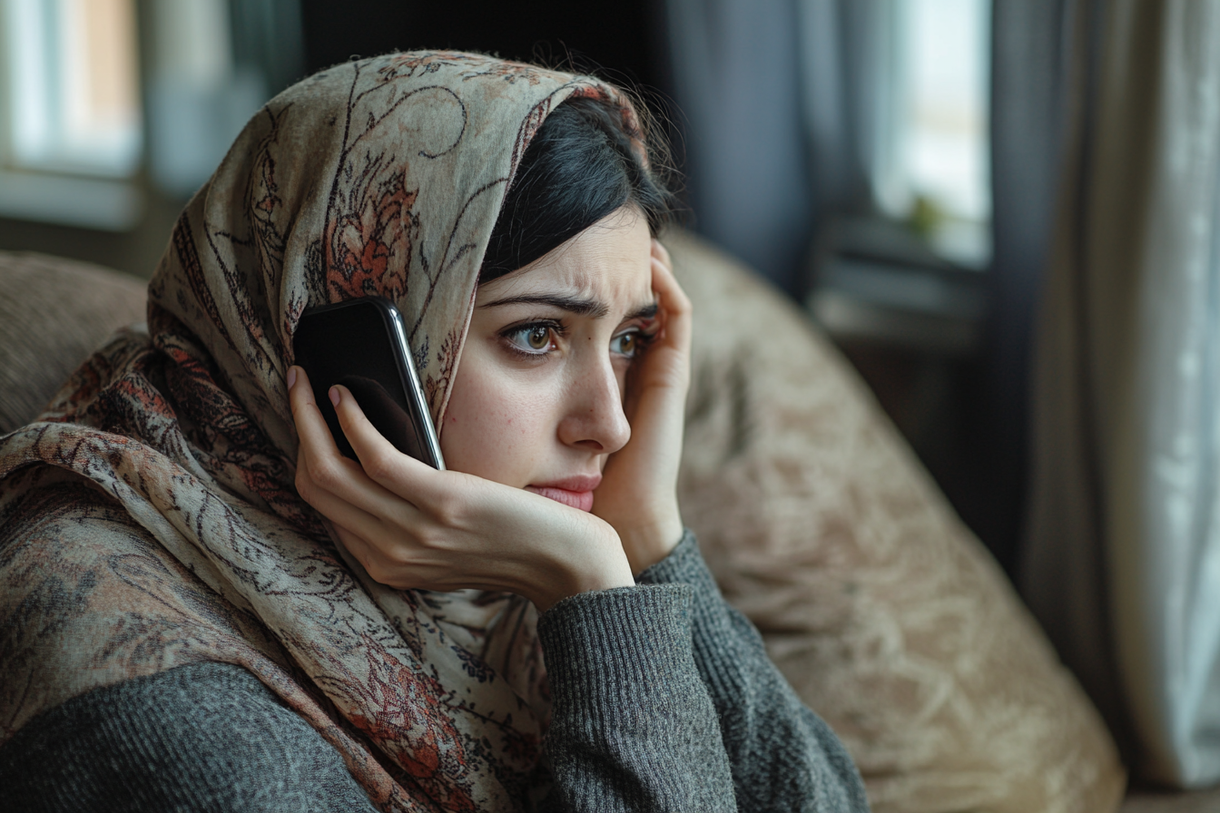 A woman speaking on her phone | Source: No source