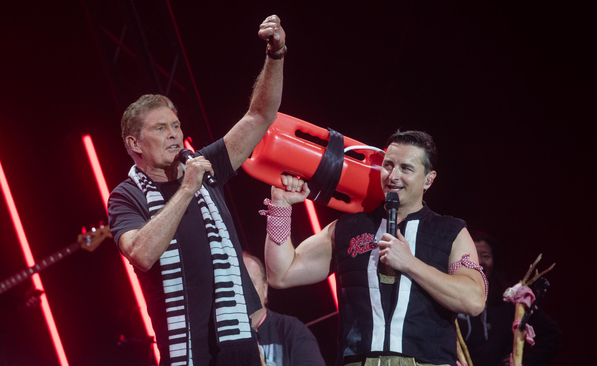 Andreas Gabalier on stage with David Haselhoff at his concert in the Olympic Stadium on June 22, 2024 | Source: Getty Images