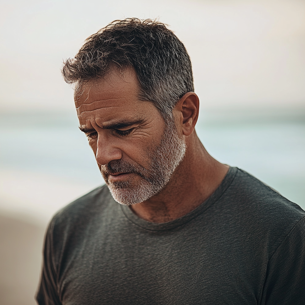 A sad man at the beach | Source: no source