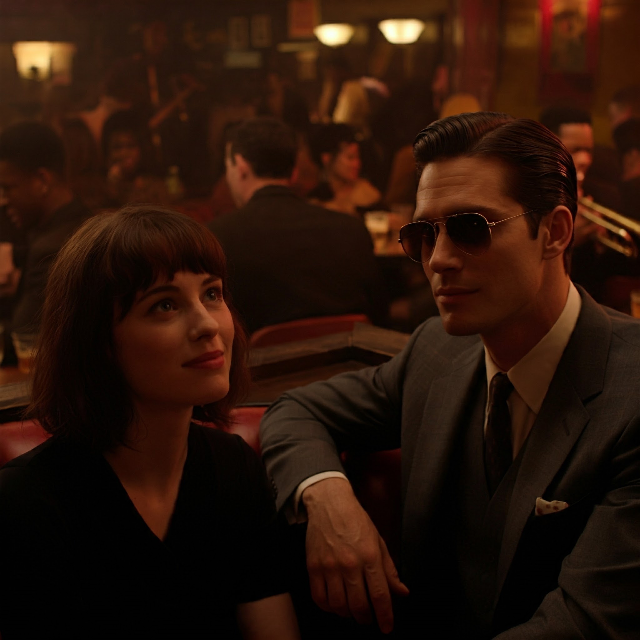 A couple in a bar looking up | Source: No source