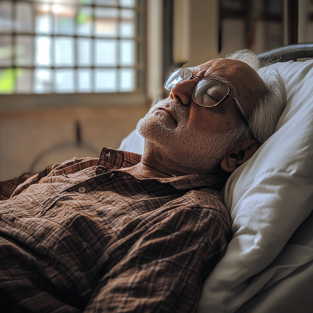 A sick senior man in a hospital bed | Source: No source
