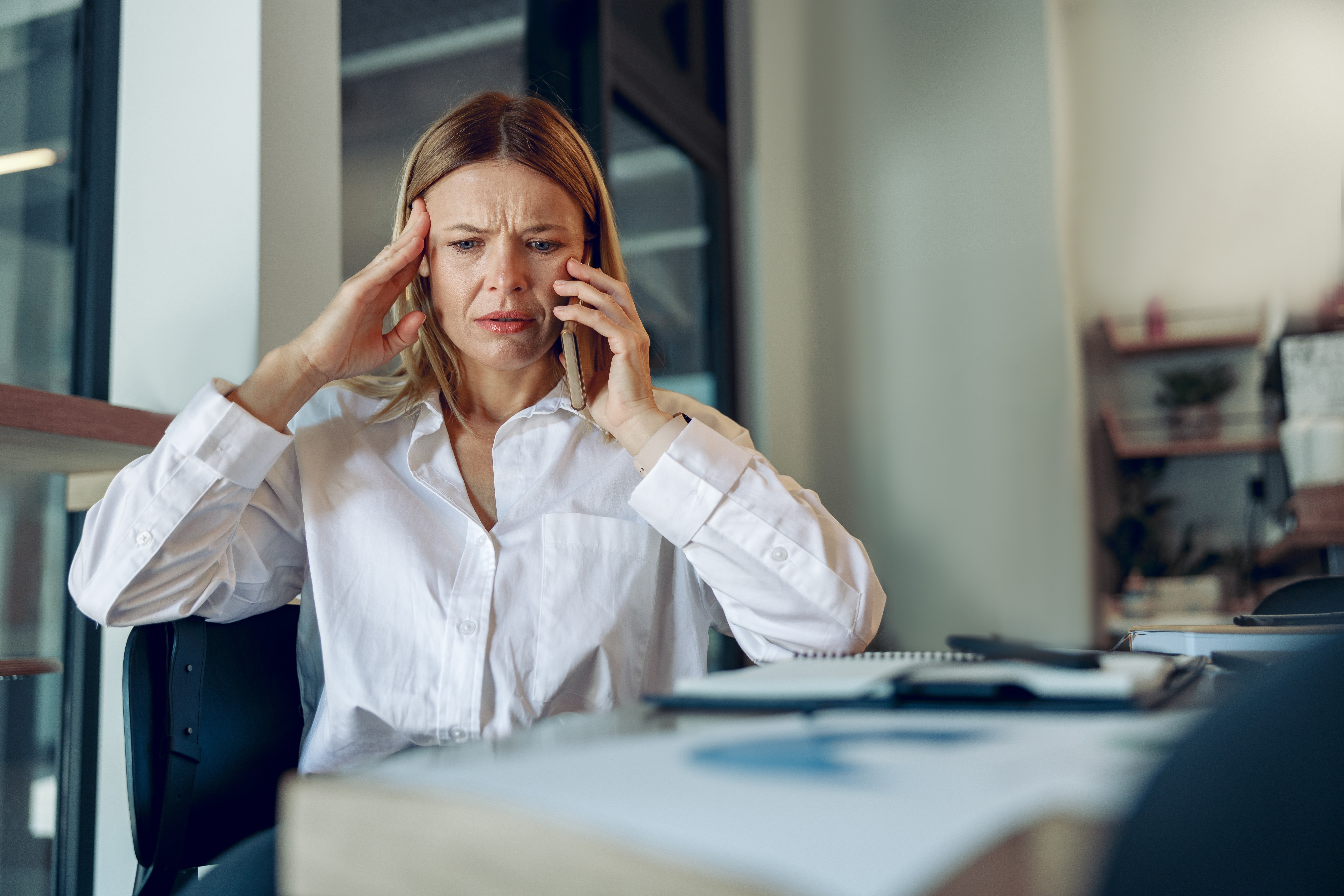 Woman with phone | Source: Shutterstock