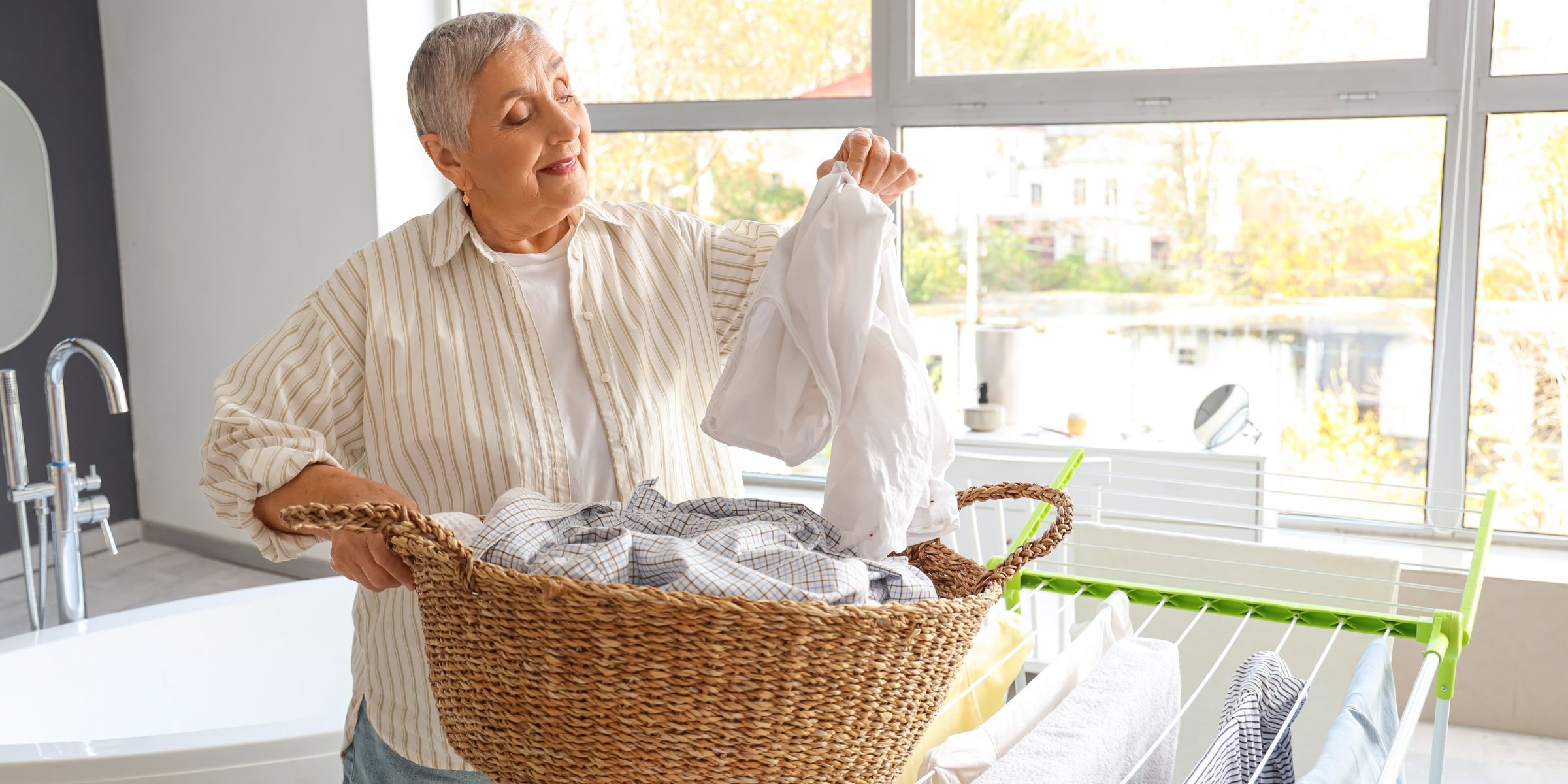 A woman sorting through laundry | Source: Shutterstock