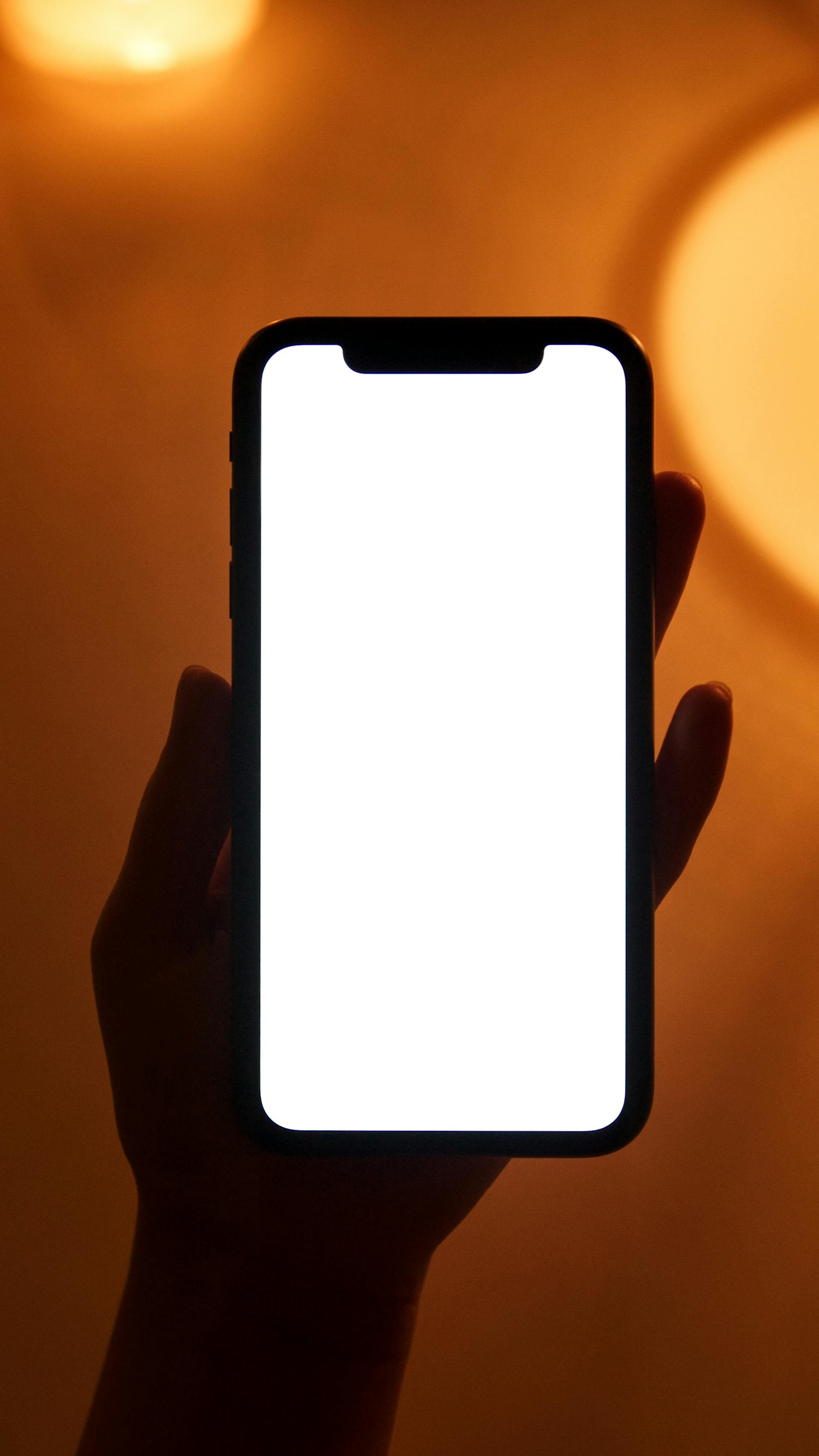 A person holding a phone | Source: Pexels