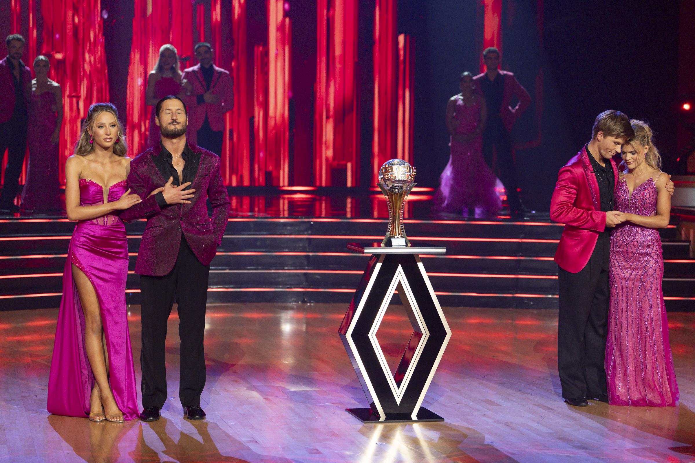 Alix Earle and Val Chmerkovskiy stand on the "DWTS" stage with Robert Irwin and Witney Carson on November 25, 2025 | Source: Getty Images