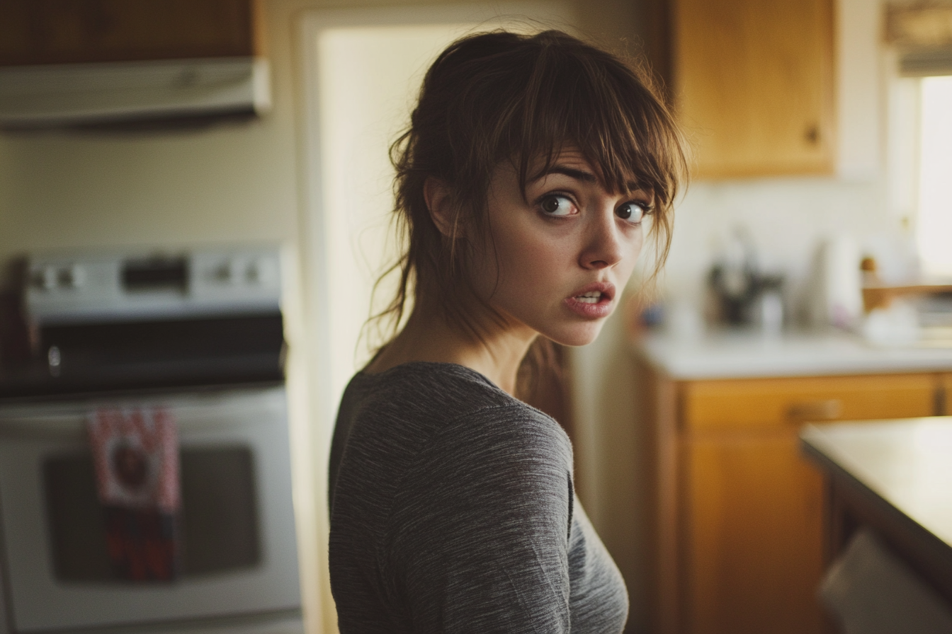 A shocked woman in a kitchen | Source: No source