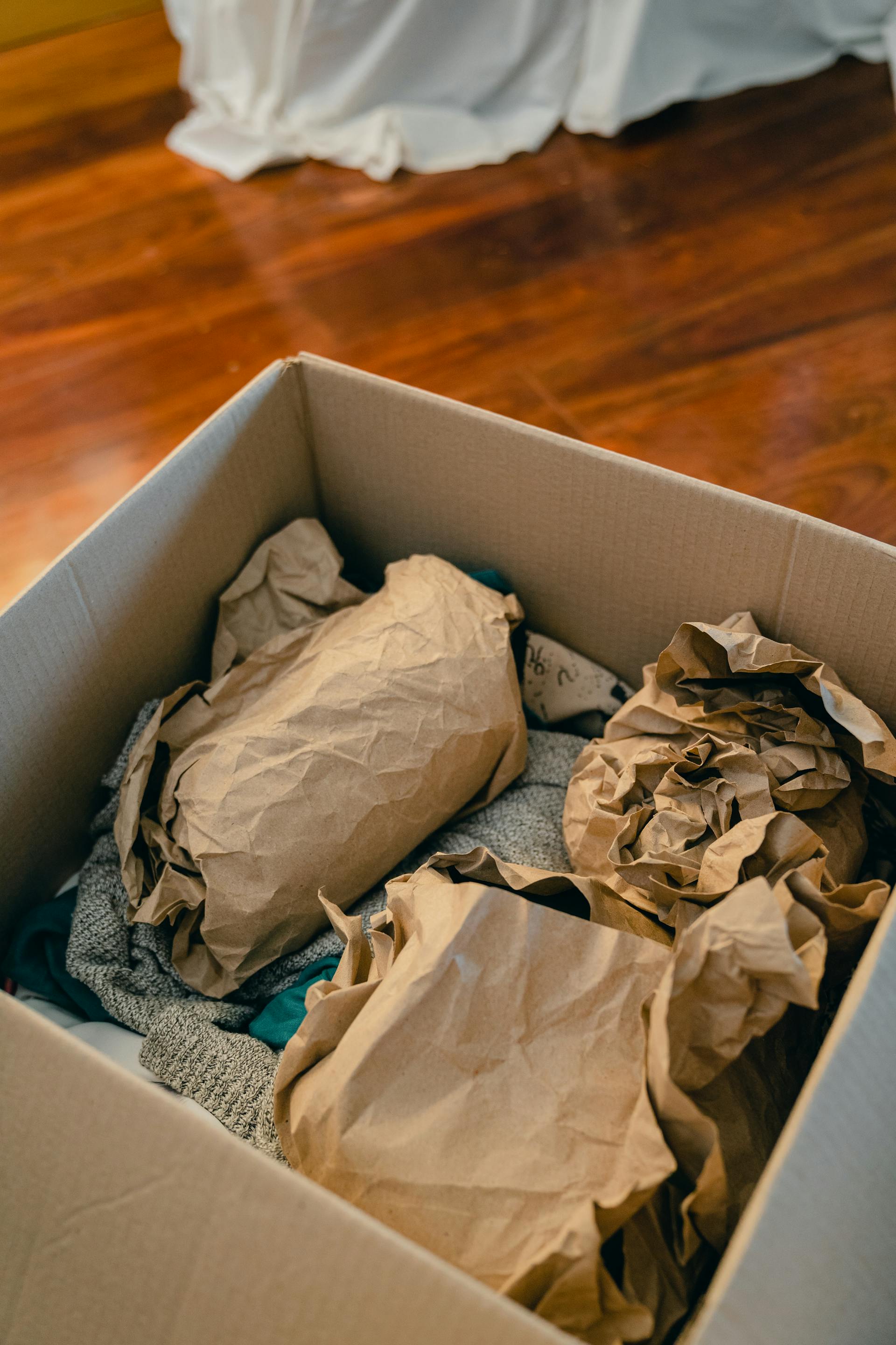 Items packed in a cardboard box | Source: Pexels