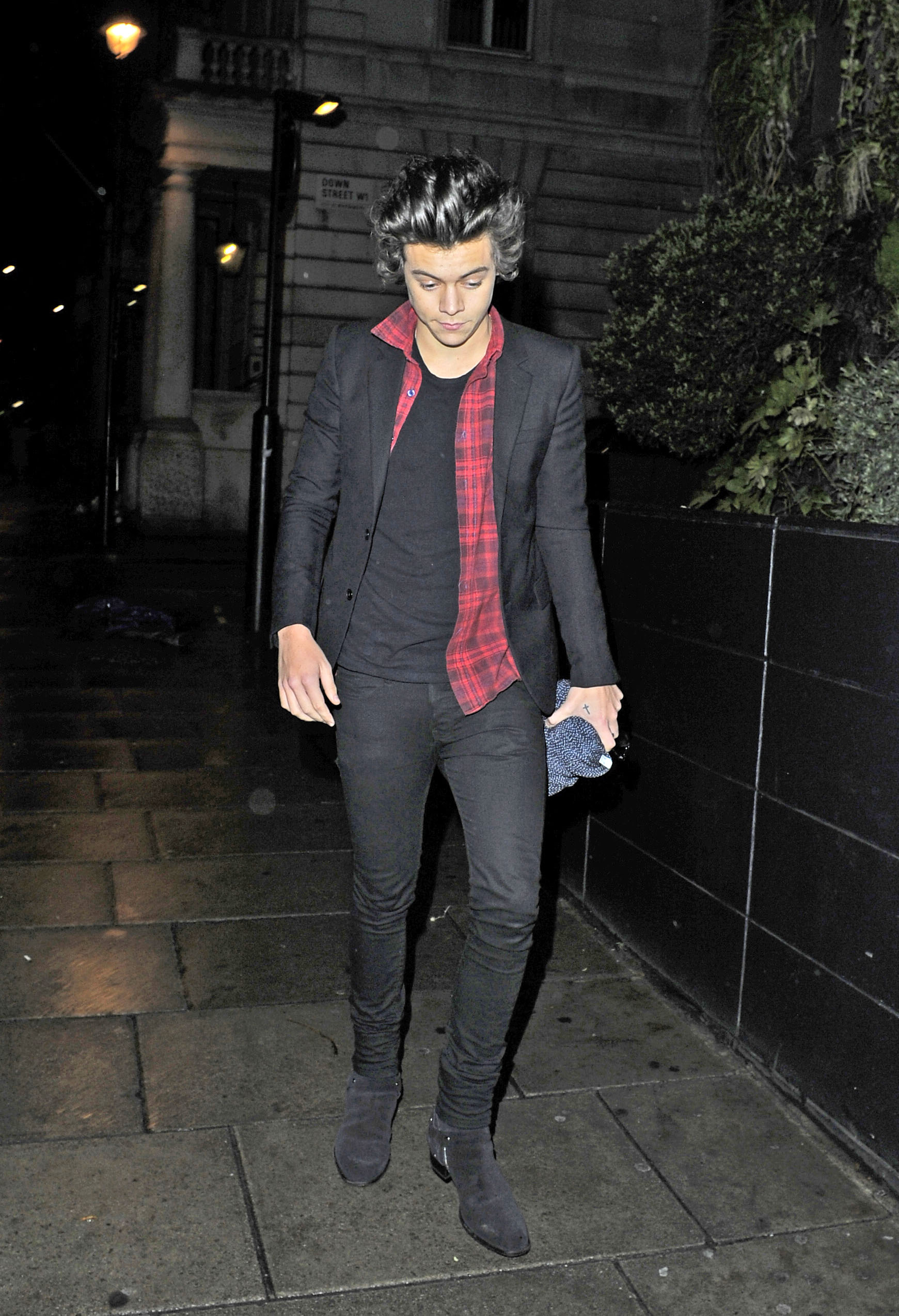 Harry Styles in London, England, on December 14, 2013. | Source: Getty Images