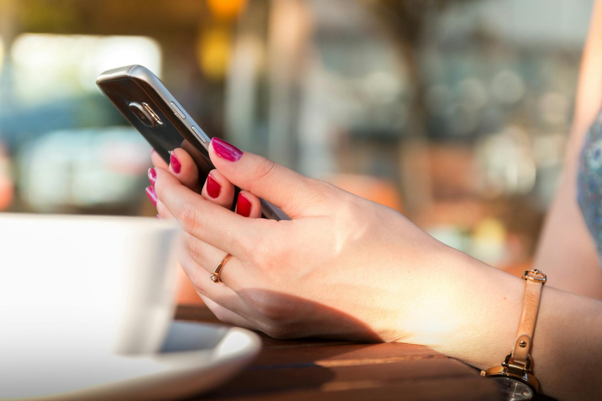 A woman checking a phone | Source: Pexels