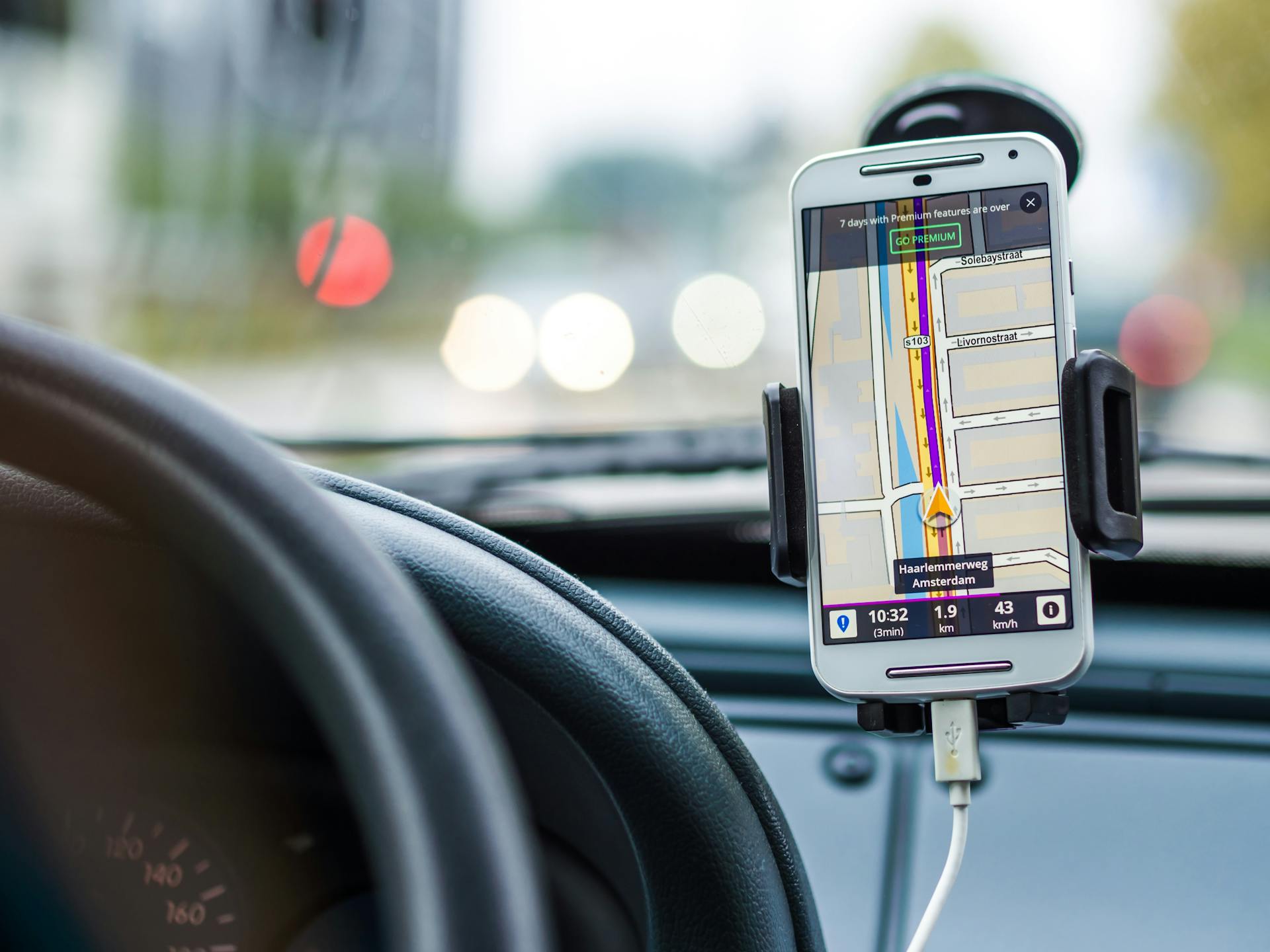 A person using a map while driving | Source: Pexels