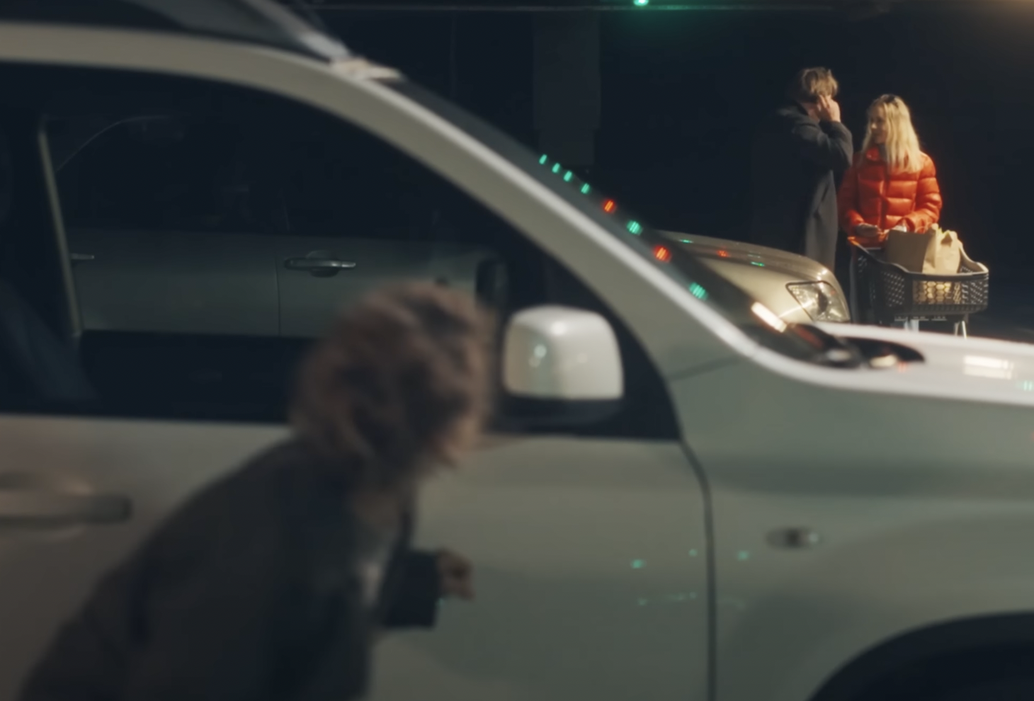 Girl hides behind the car | Source: Facebook/LoveBuster