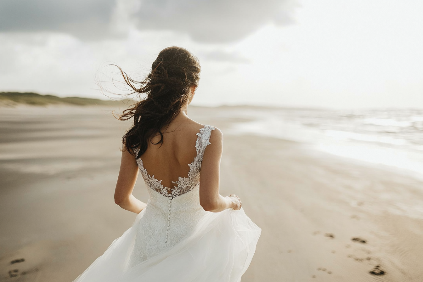 A bride running on a beach | Source: no source