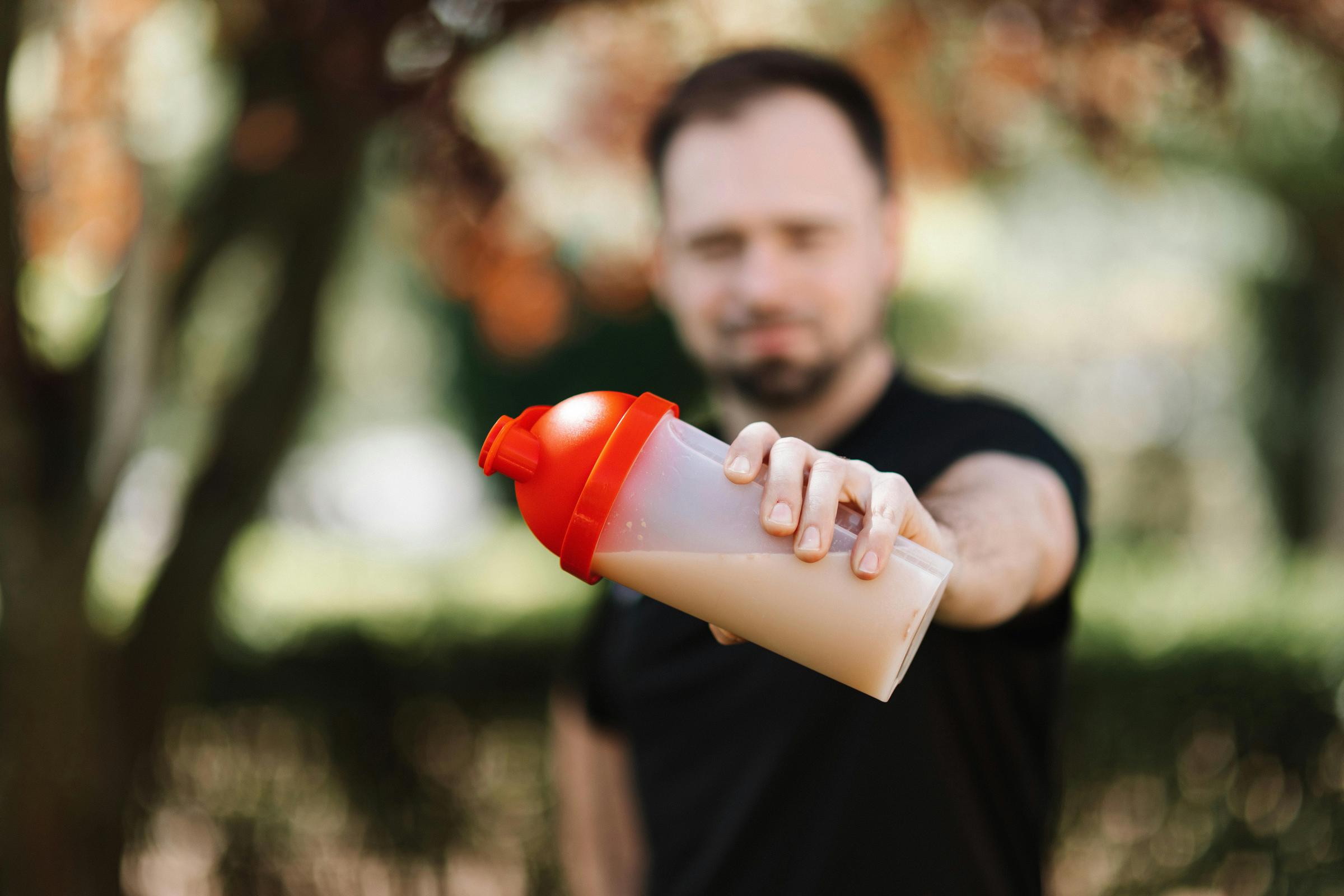 Man holding a bottle | Source: Pexels