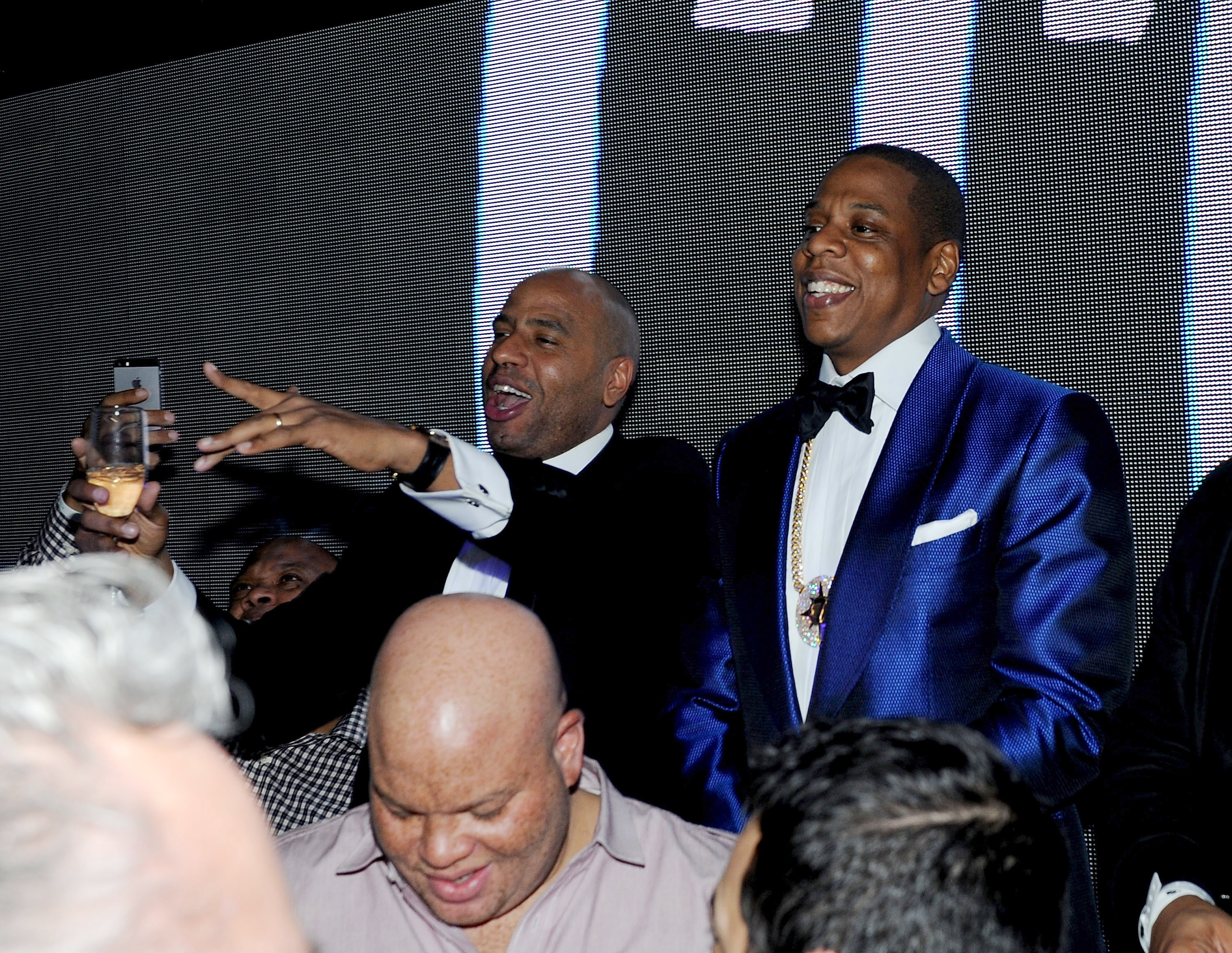 Juan Perez, Shawn Costner, and Jay Z at the Magna Carter tour after-party hosted by Jay Z and D'USSE Cognac on December 13, 2013, in Las Vegas, Nevada. | Source: Getty Images