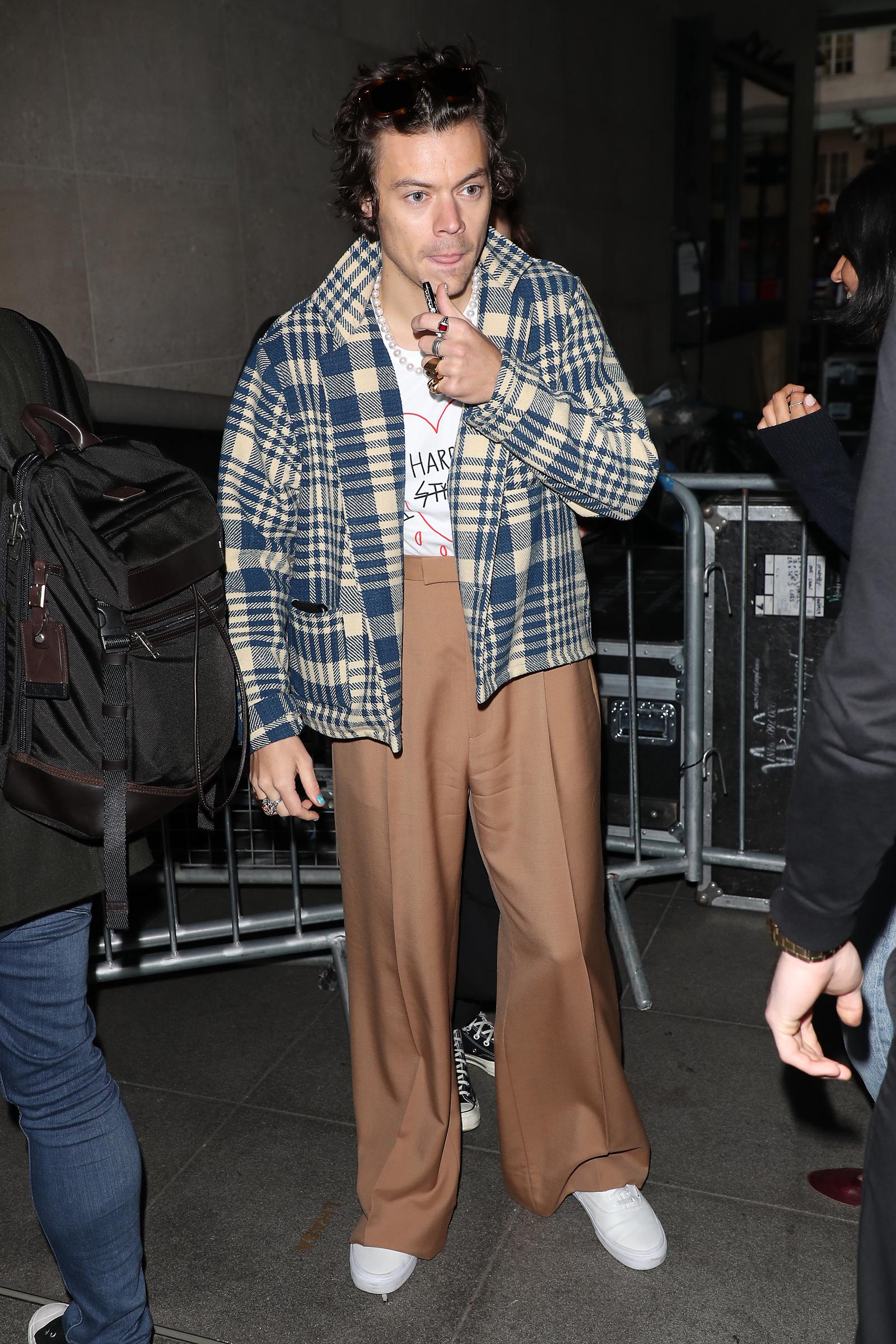 Harry Styles leaving BBC Radio One after performing in the Live Lounge on December 18, 2019, in London, England. | Source: Getty Images