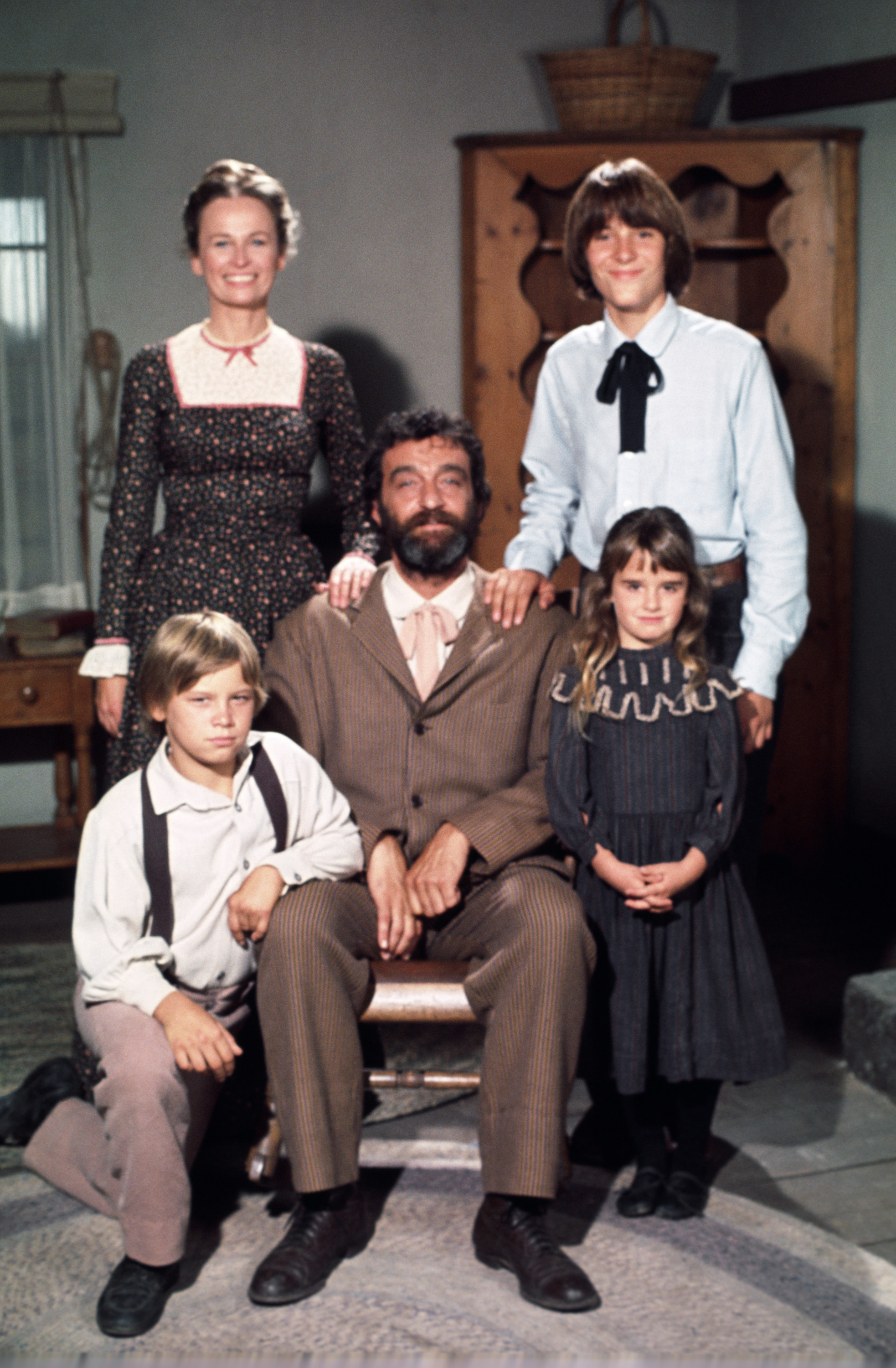 Bonnie Bartlett as Grace Snider, Radames Pera as John Sanderson, Brian Part as Carl Sanderson, Victor French as Isaiah Edwards, and Kyle Richards as Alicia Sanderson in "Little House on the Prairie," dated 1975 | Source: Getty Images