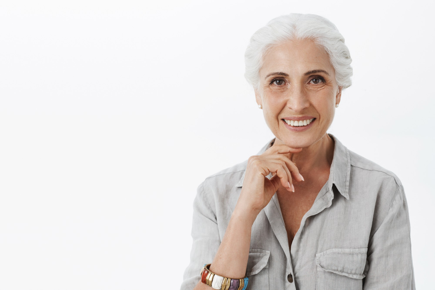 A smiling senior woman | Source: Freepik