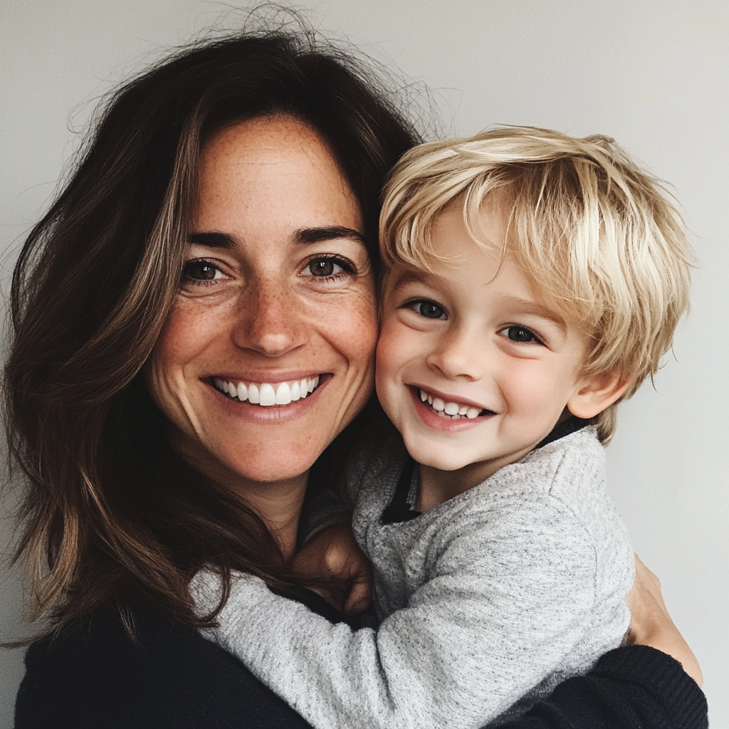 A smiling mother and son duo | Source: No source