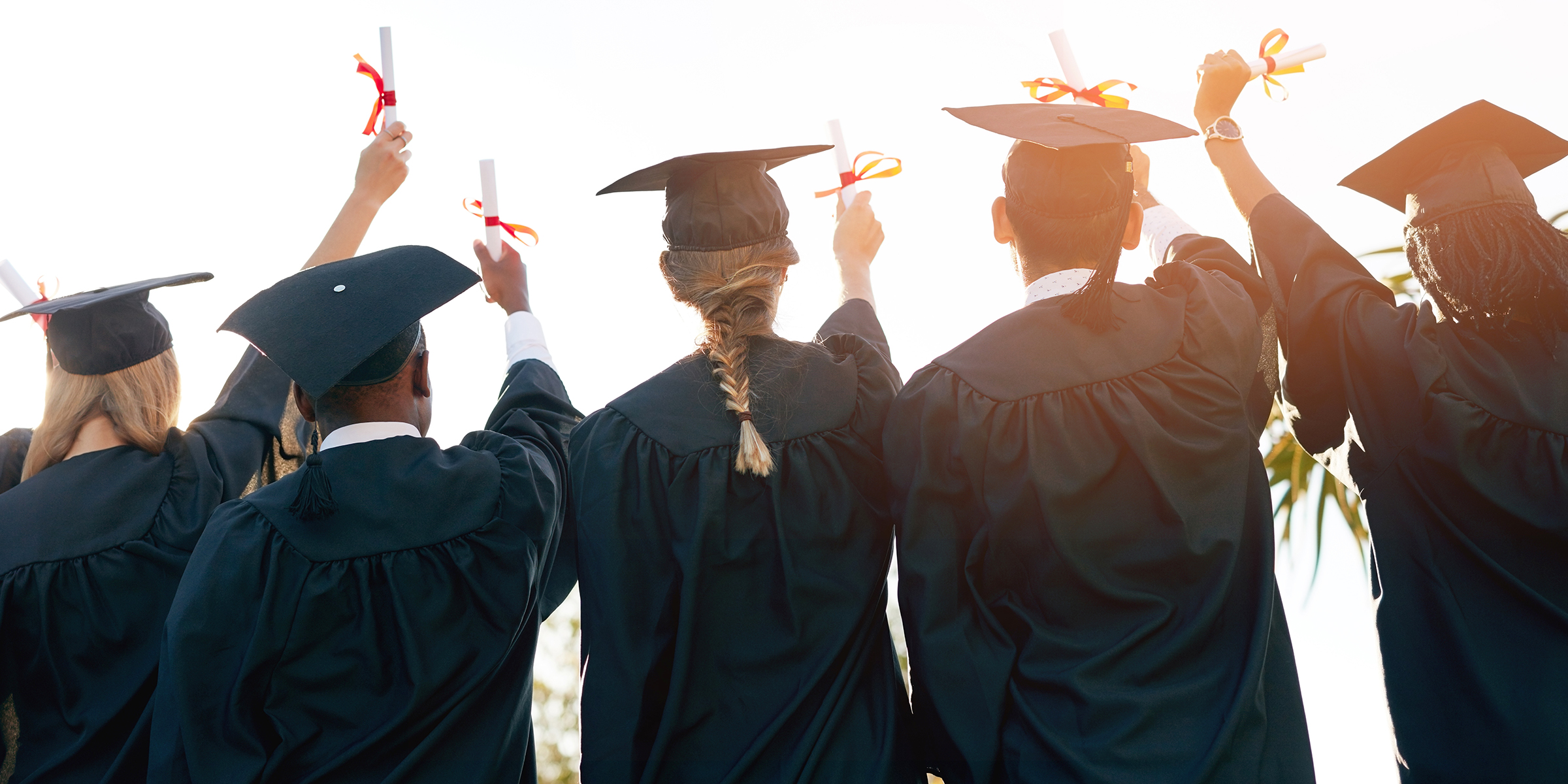 Students celebrating their graduation | Source: Shutterstock