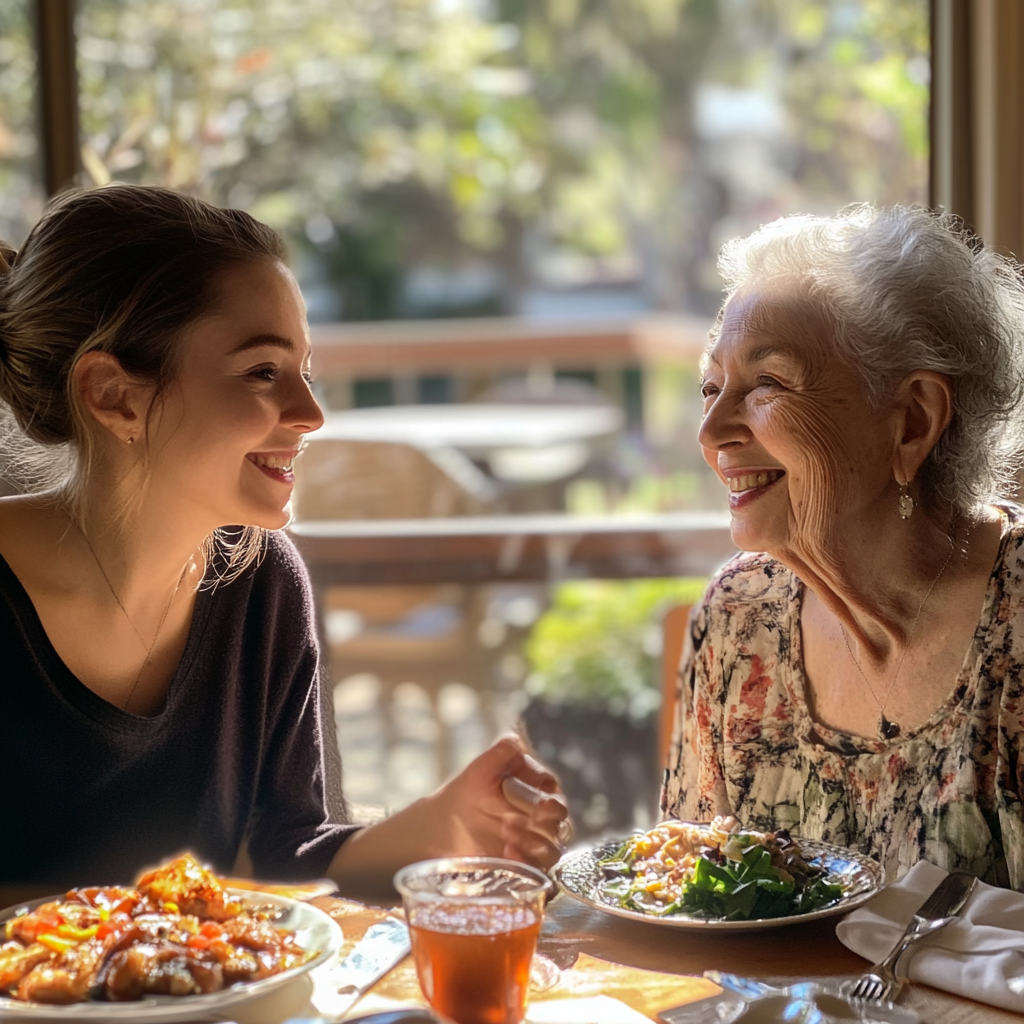 Young lady and senior woman having lunch | Source: no source