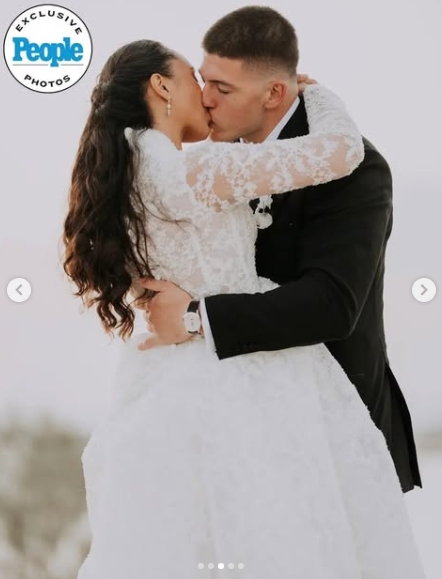 George Karlaftis and Kaia Harris shared a kiss following their wedding ceremony in Greece. | Source: Instagram/people