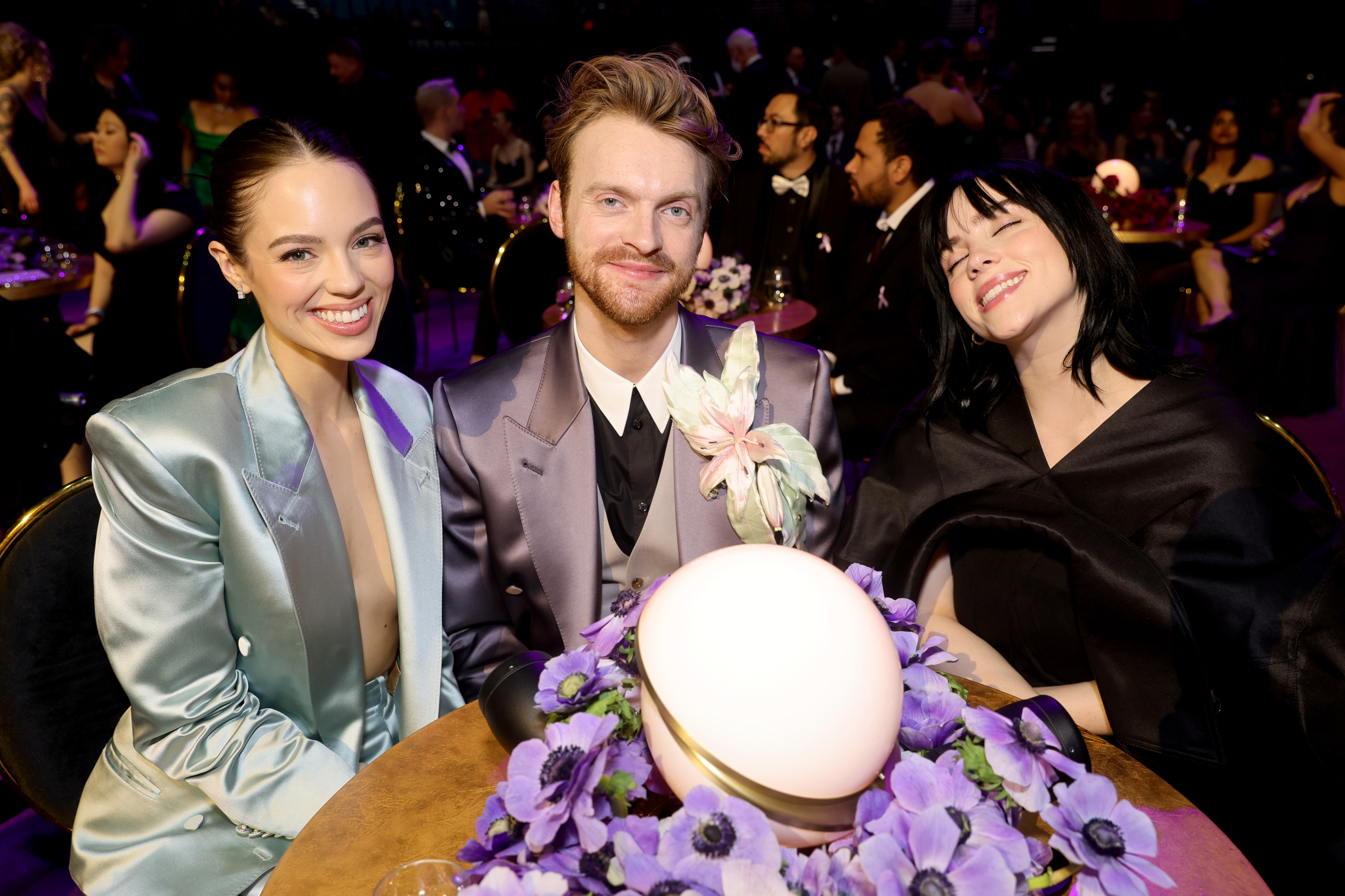 Claudia Sulewski, Finneas O'Connell, and Billie Eilish attend the 64th Annual GRAMMY Awards on April 3, 2022 | Source: Getty Images