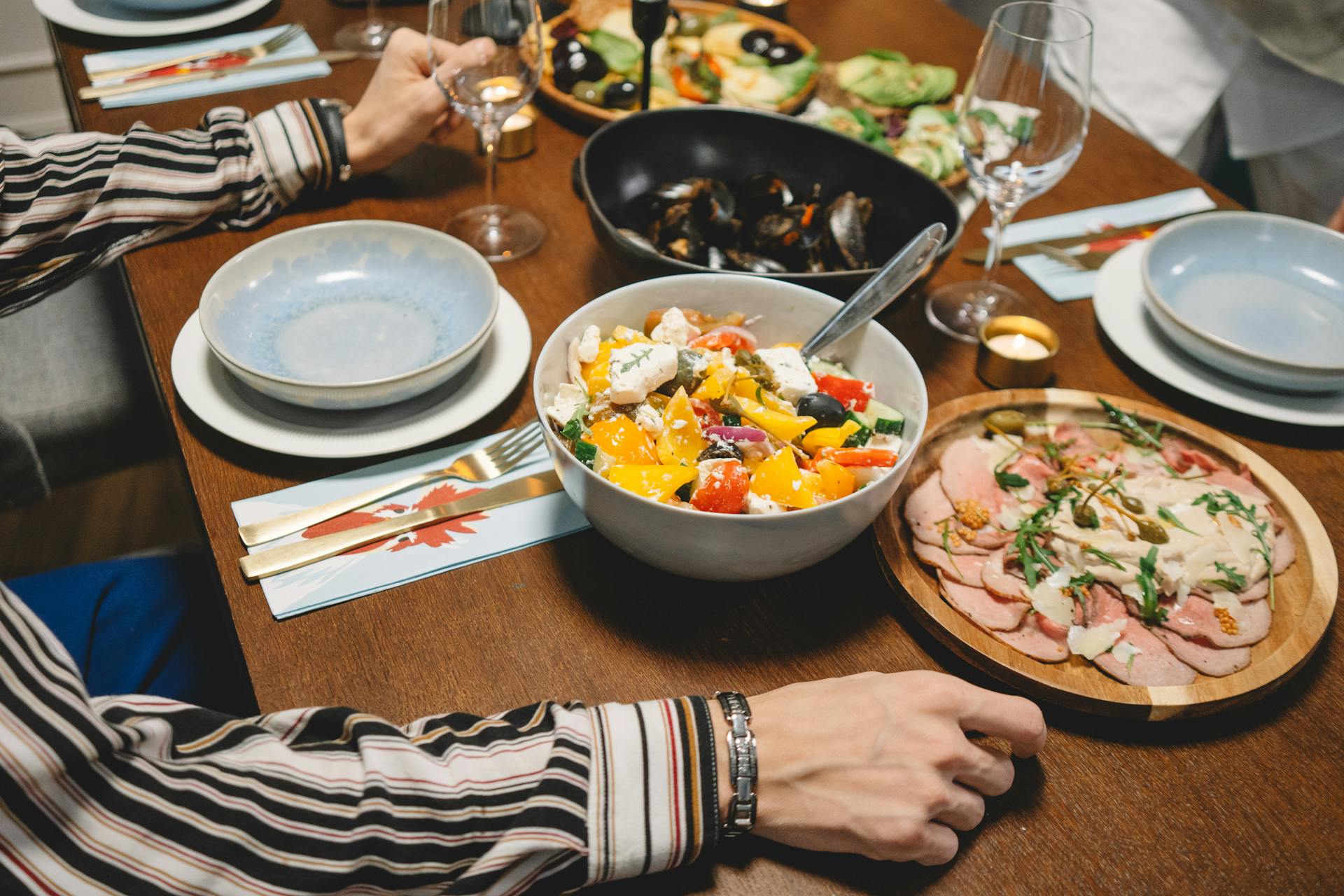 A woman seated at a dining table | Source: Pexels