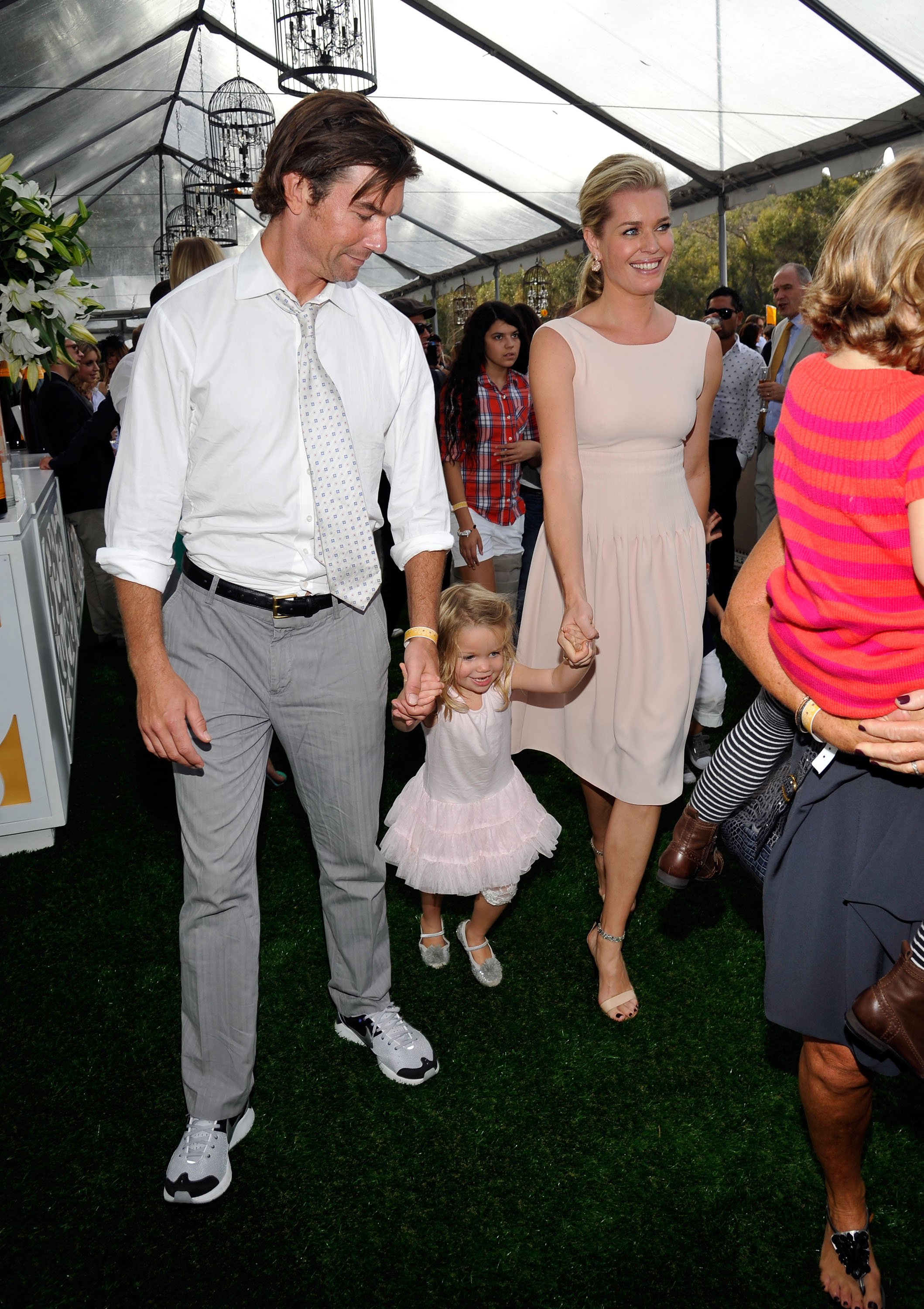 Jerry O'Connell and Rebecca Romijn with their daughter attend the Third Annual Veuve Clicquot Polo Classic at Will Rogers State Historic Park in Pacific Palisades, California  on October 6, 2012 | Source: Getty Images