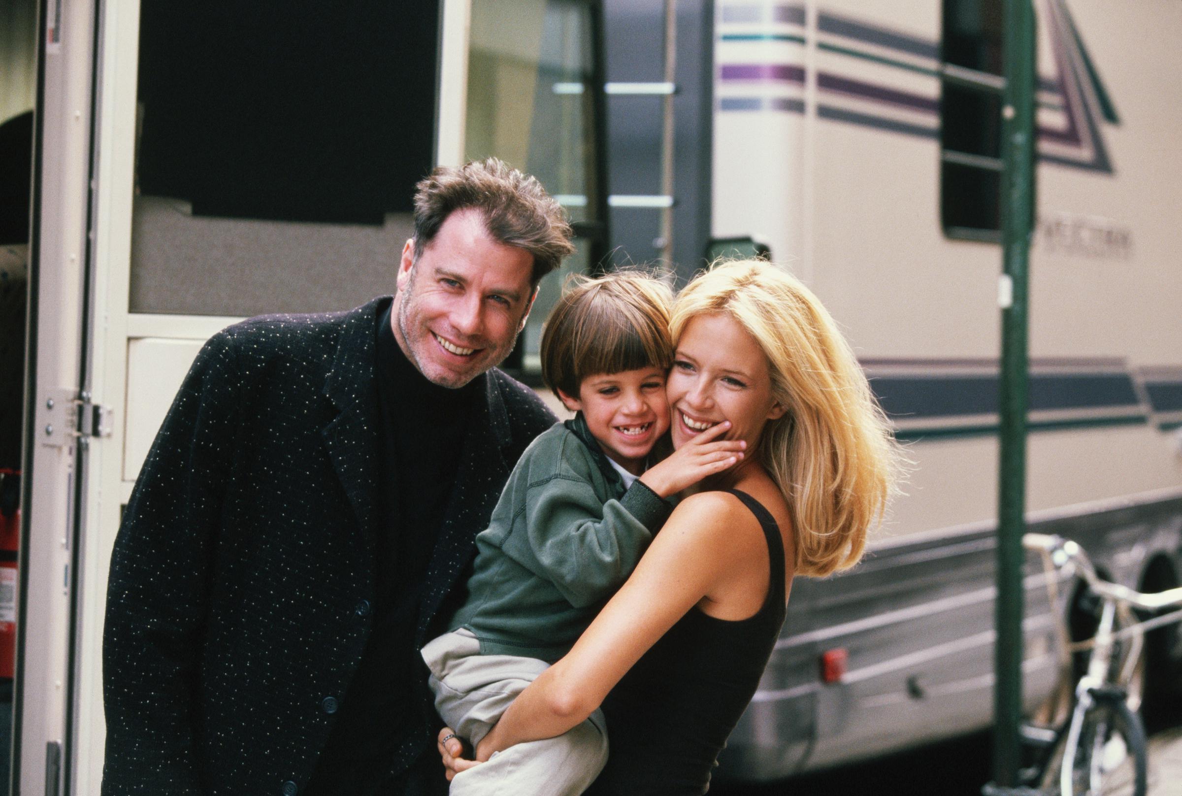 Kelly Preston gets a visit from husband John Travolta and son Jett while on location filming the 1997 motion picture "Addicted to Love." | Source: Getty Images