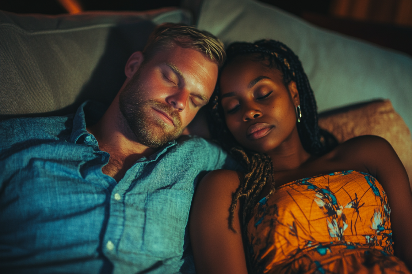 An exhausted couple on a sofa | Source: no source