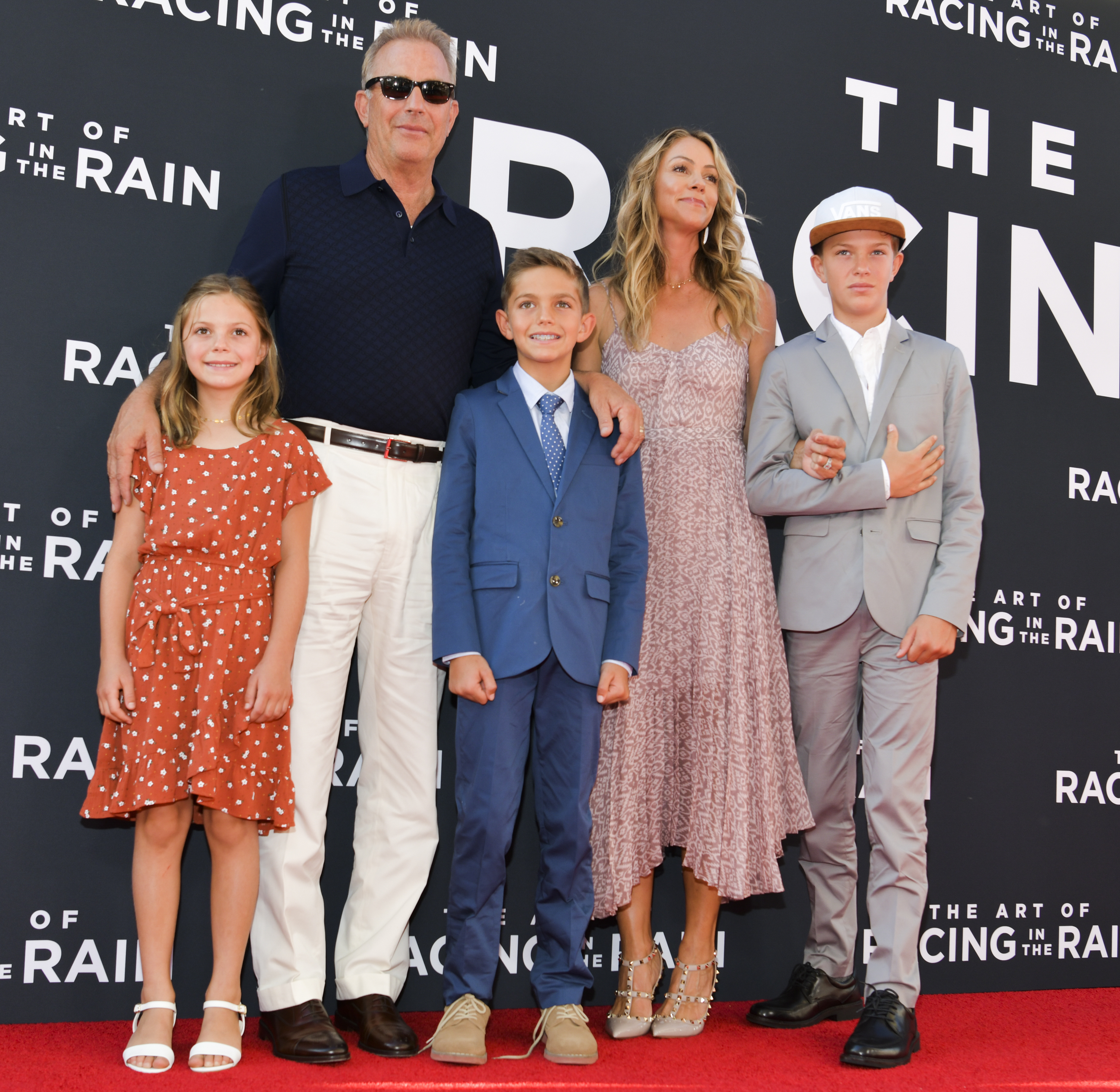 Kevin Costner, Christine Baumgartner, and their children at El Capitan Theater on August 01, 2019, in Los Angeles, California. | Source: Getty Images