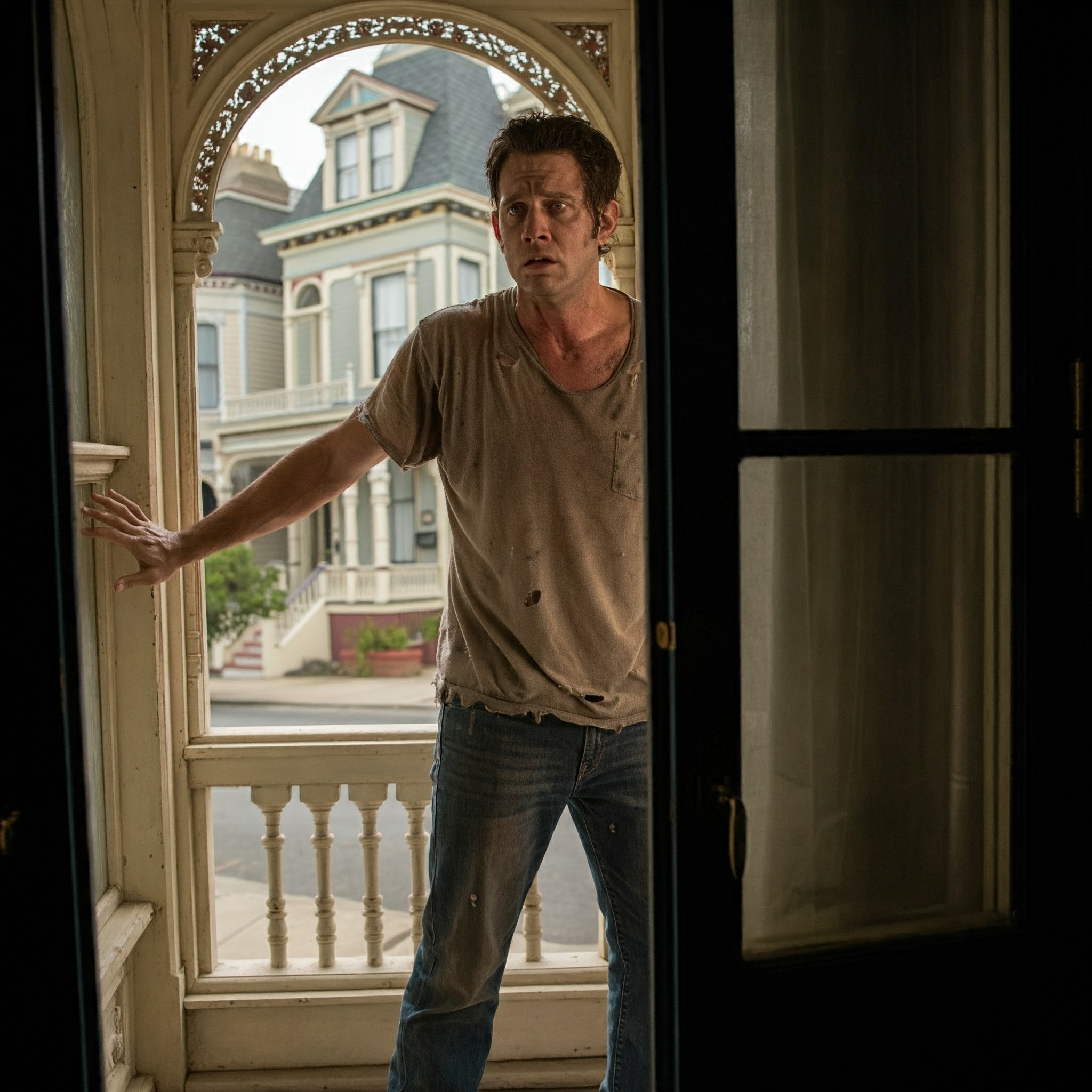 A dishelved man on the porch | Source: No source