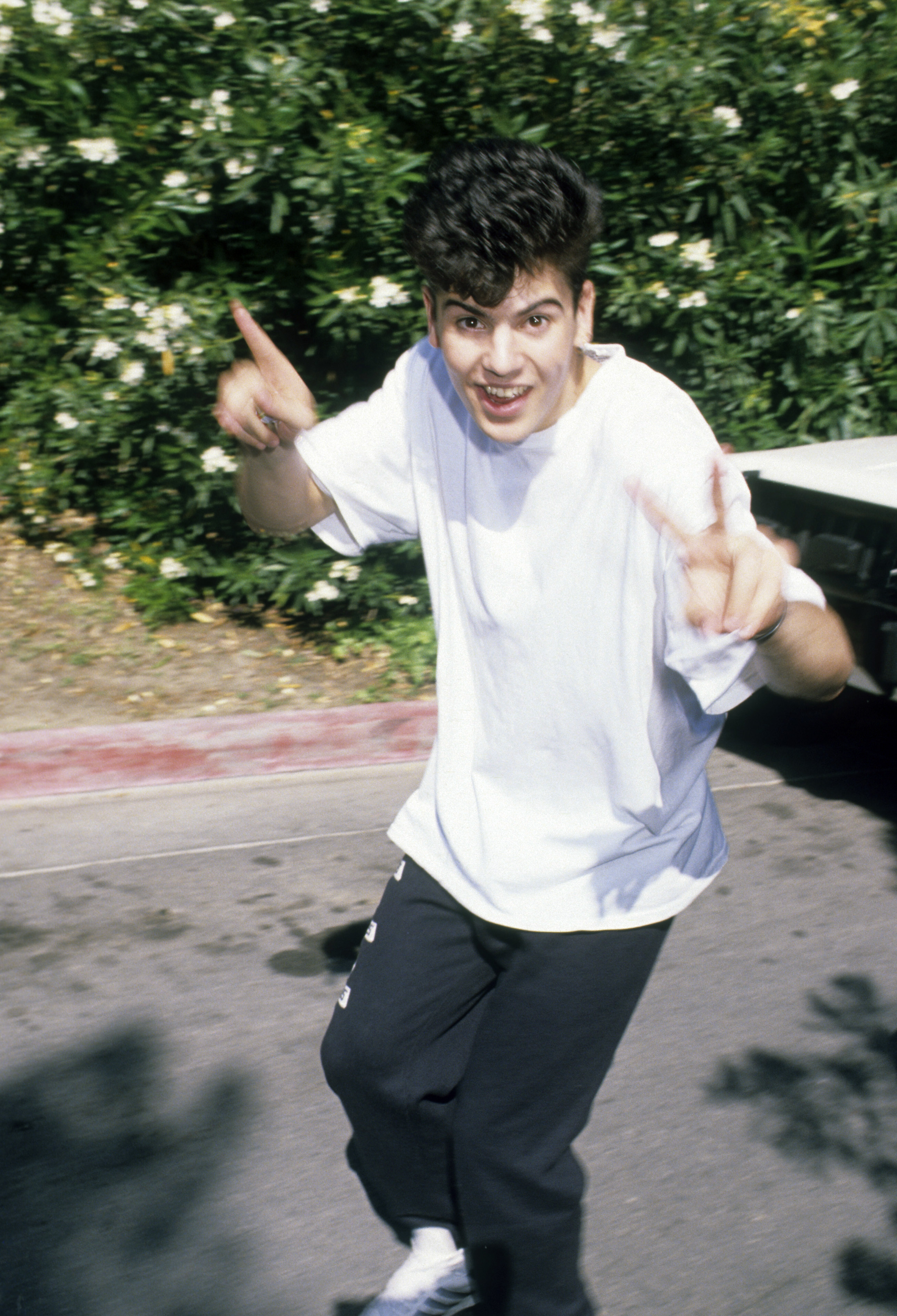 Jordan Knight being silly while posing for the camera circa 1989. | Source: Getty Images