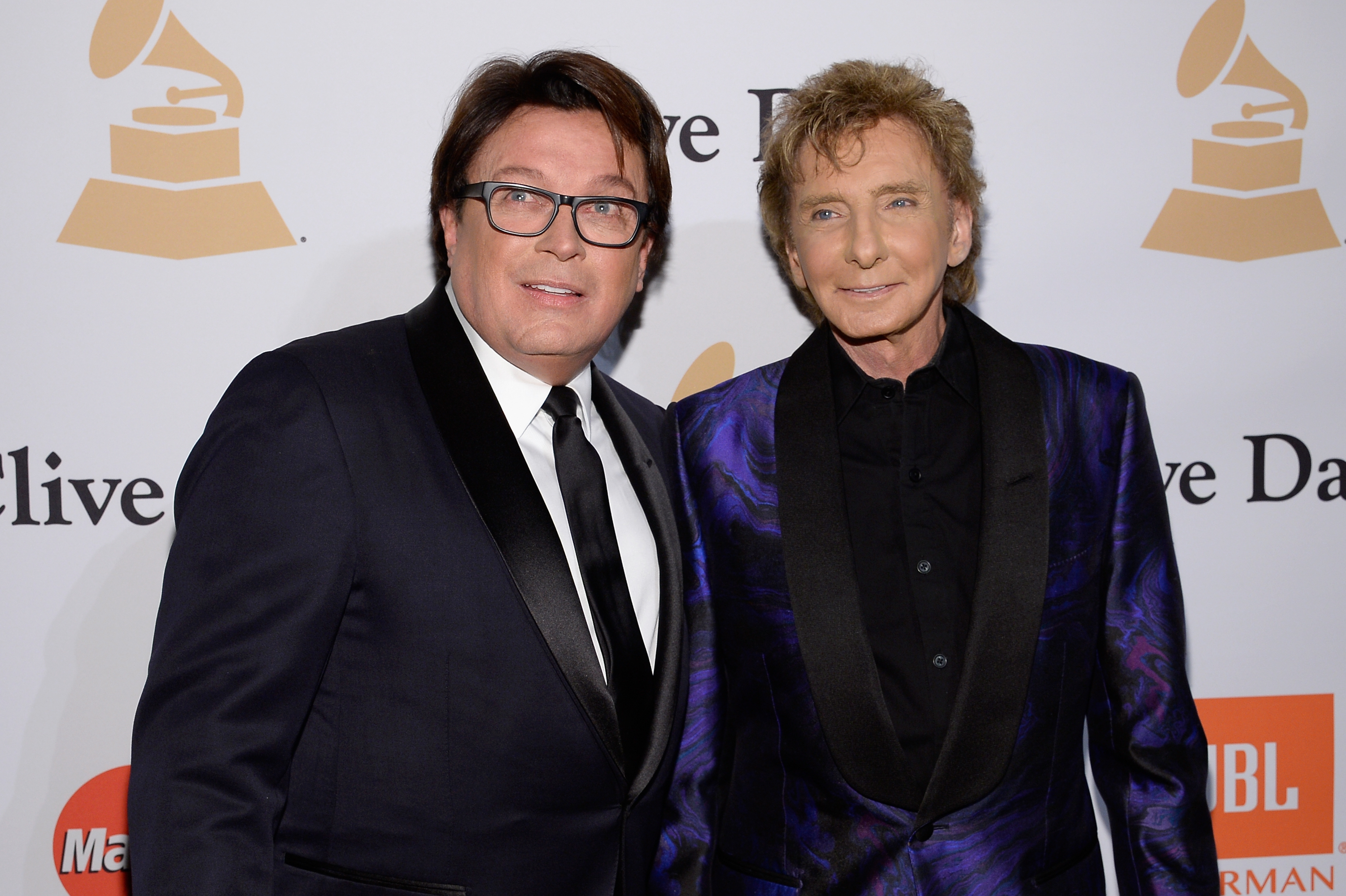 Garry Kief and Barry Manilow attend the Pre-GRAMMY Gala at The Beverly Hilton in California, on February 14, 2016 | Source: Getty Images