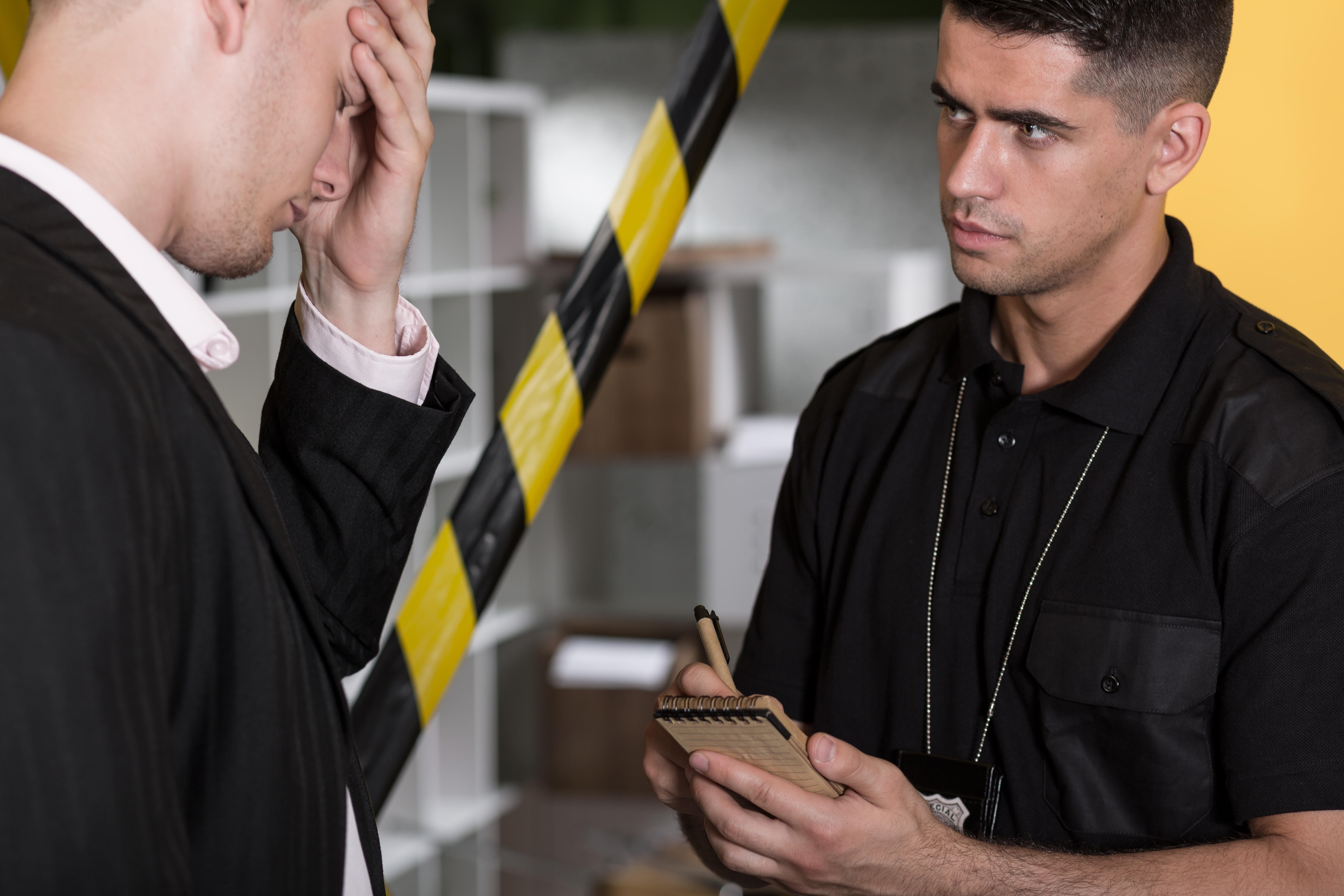 Man with police | Source: Shutterstock