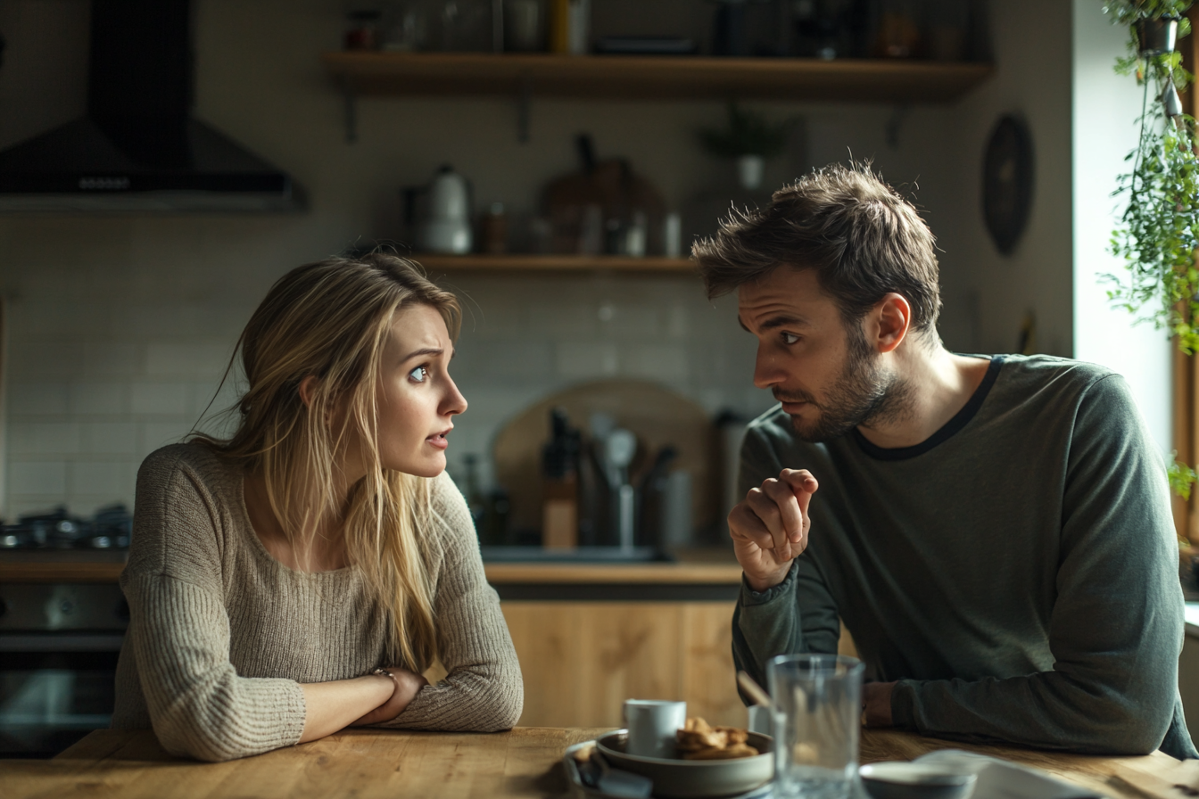 A couple speaking in their kitchen | Source: No source