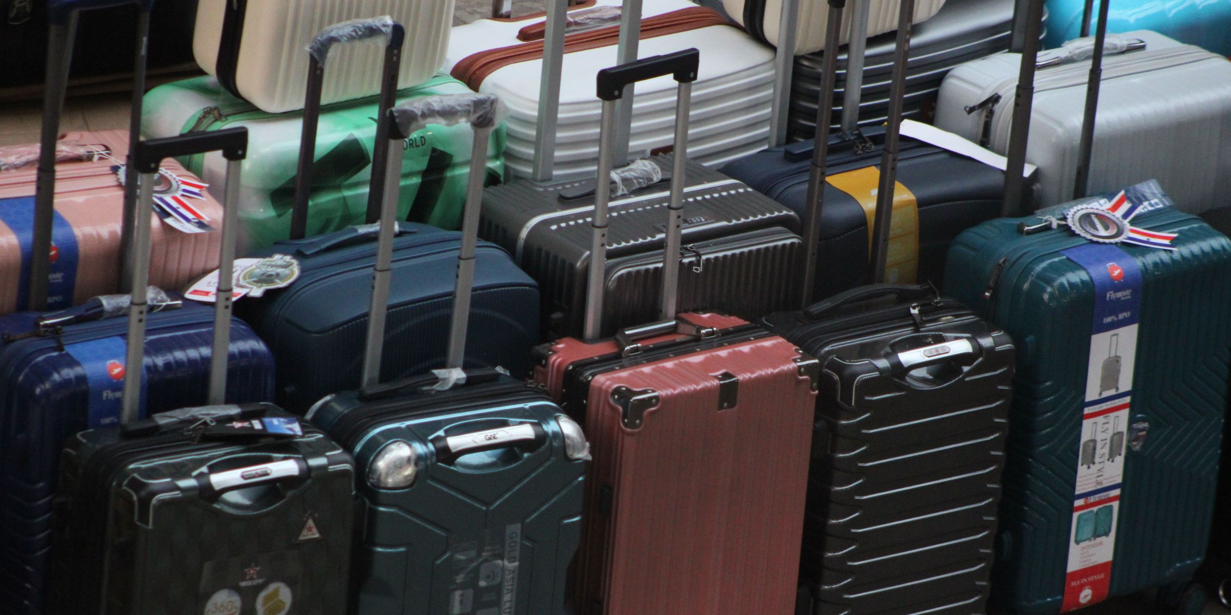 Rows of a variety of luggage bags | Source: Pexels