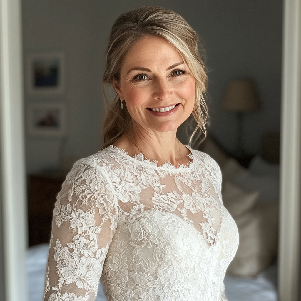 A smiling woman wearing a wedding dress | Source: No source