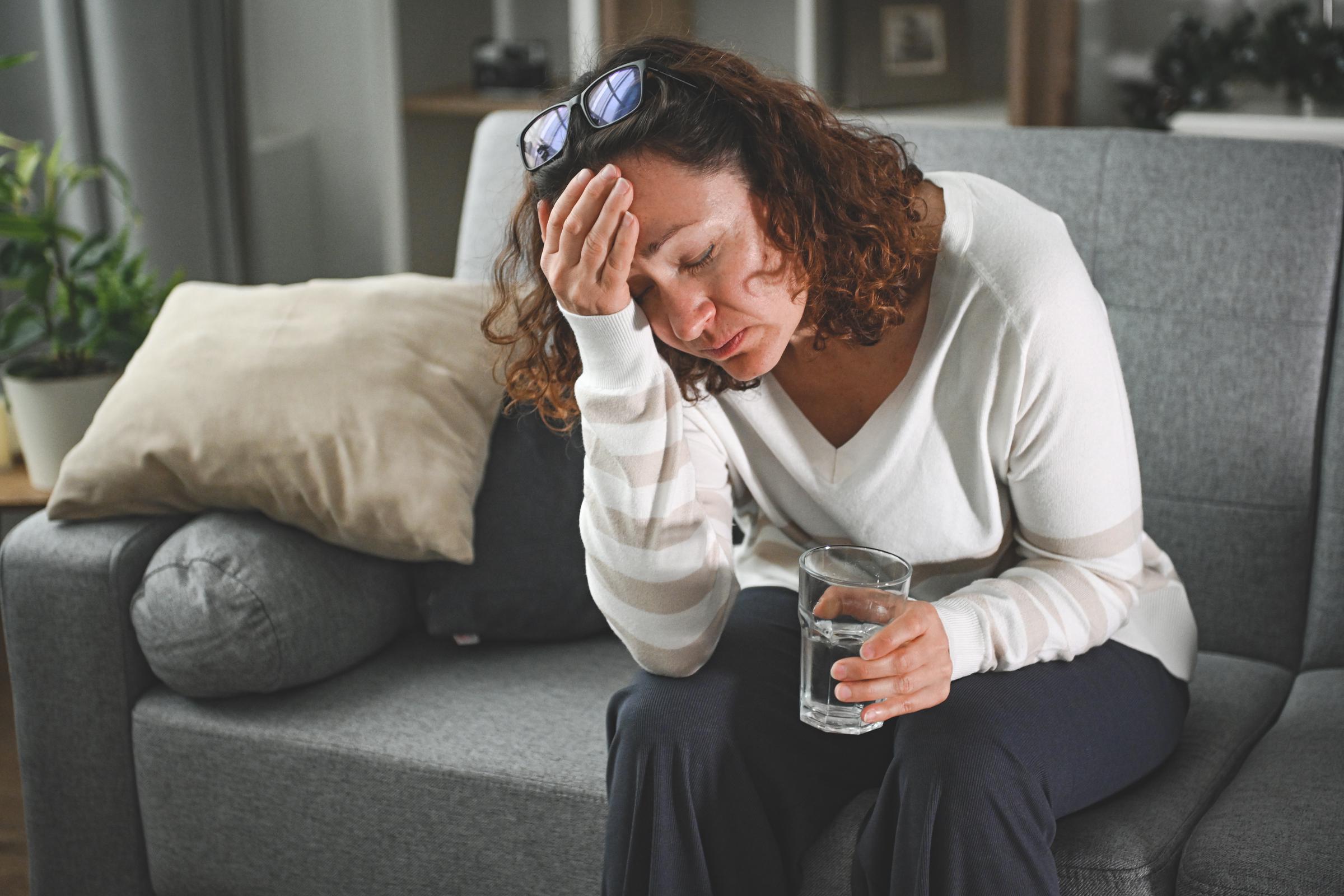 A woman experiencing heat stroke | Source: Getty Images