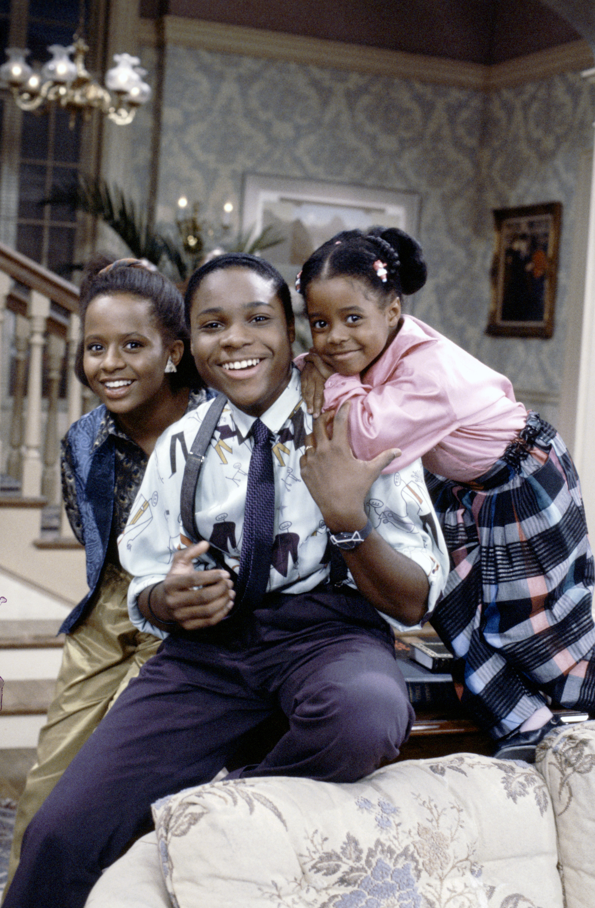 Vanessa, Theo, and Rudy Huxtable photographed together on the set of "The Cosby Show." | Source: Getty Images