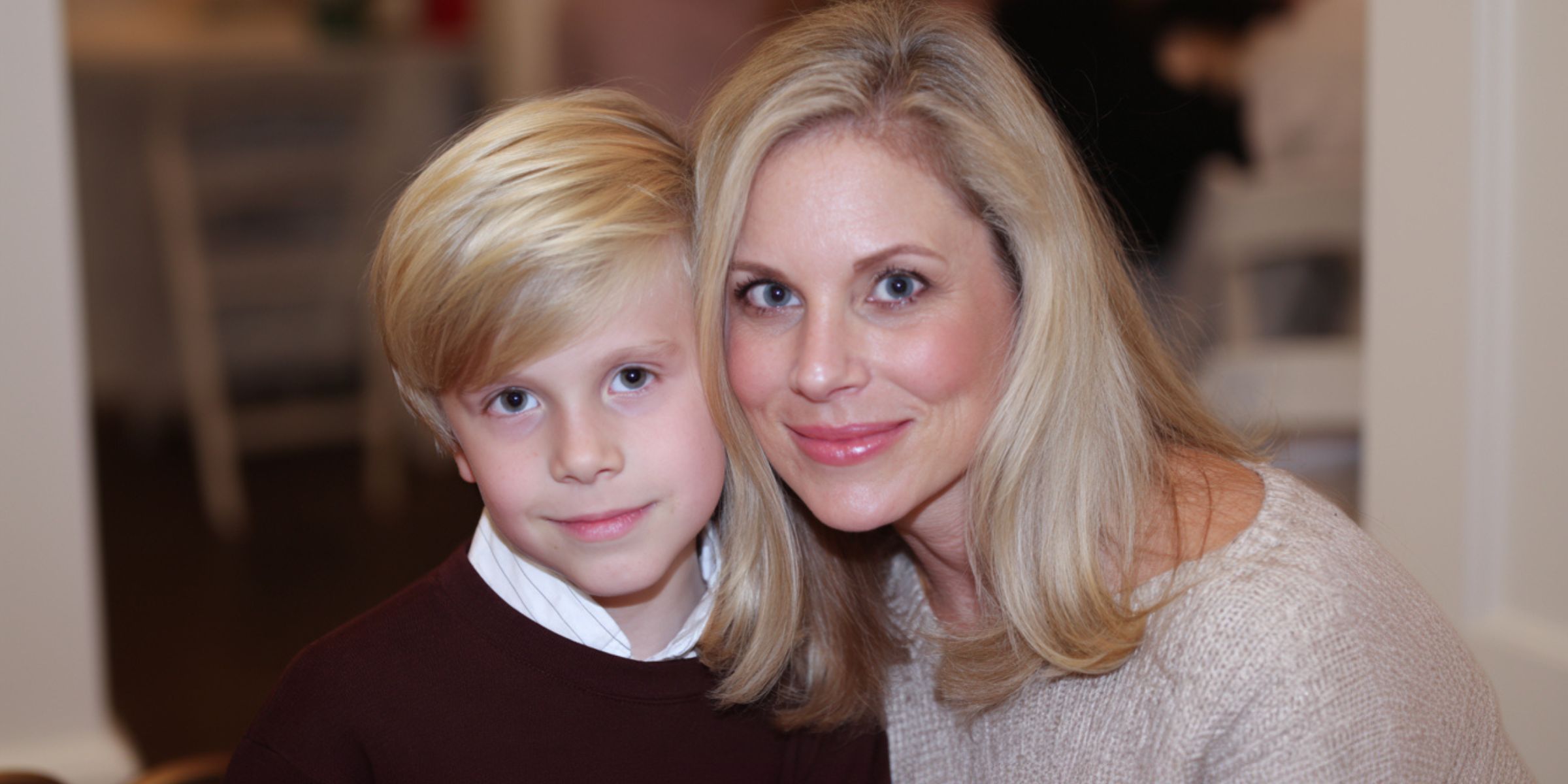A smiling woman and little boy | Source: AmoMama
