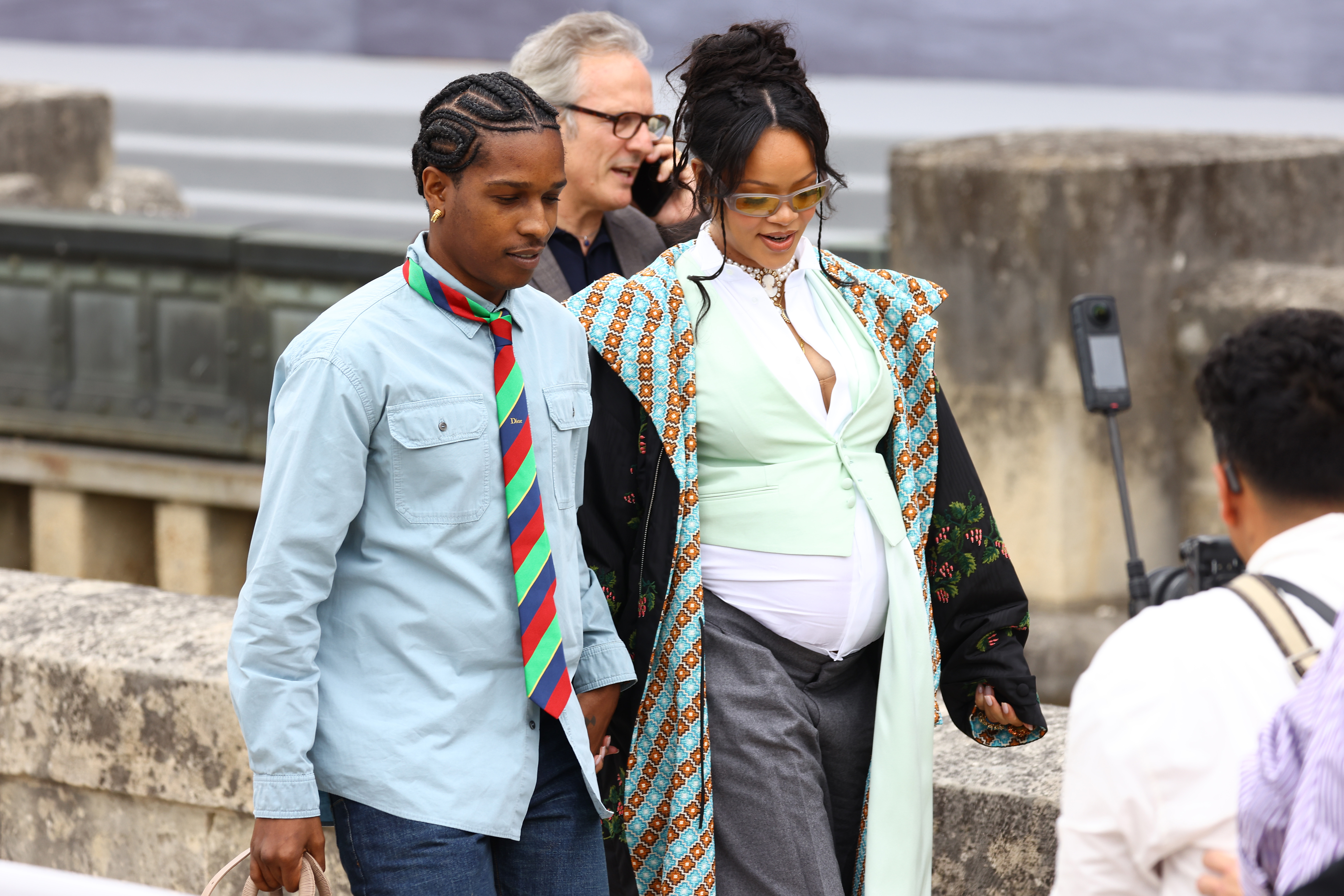 A$AP Rocky and Rihanna at the Dior Homme Menswear Spring/Summer 2026 show as part of Paris Fashion Week on June 27, 2025, in France. | Source: Getty Images