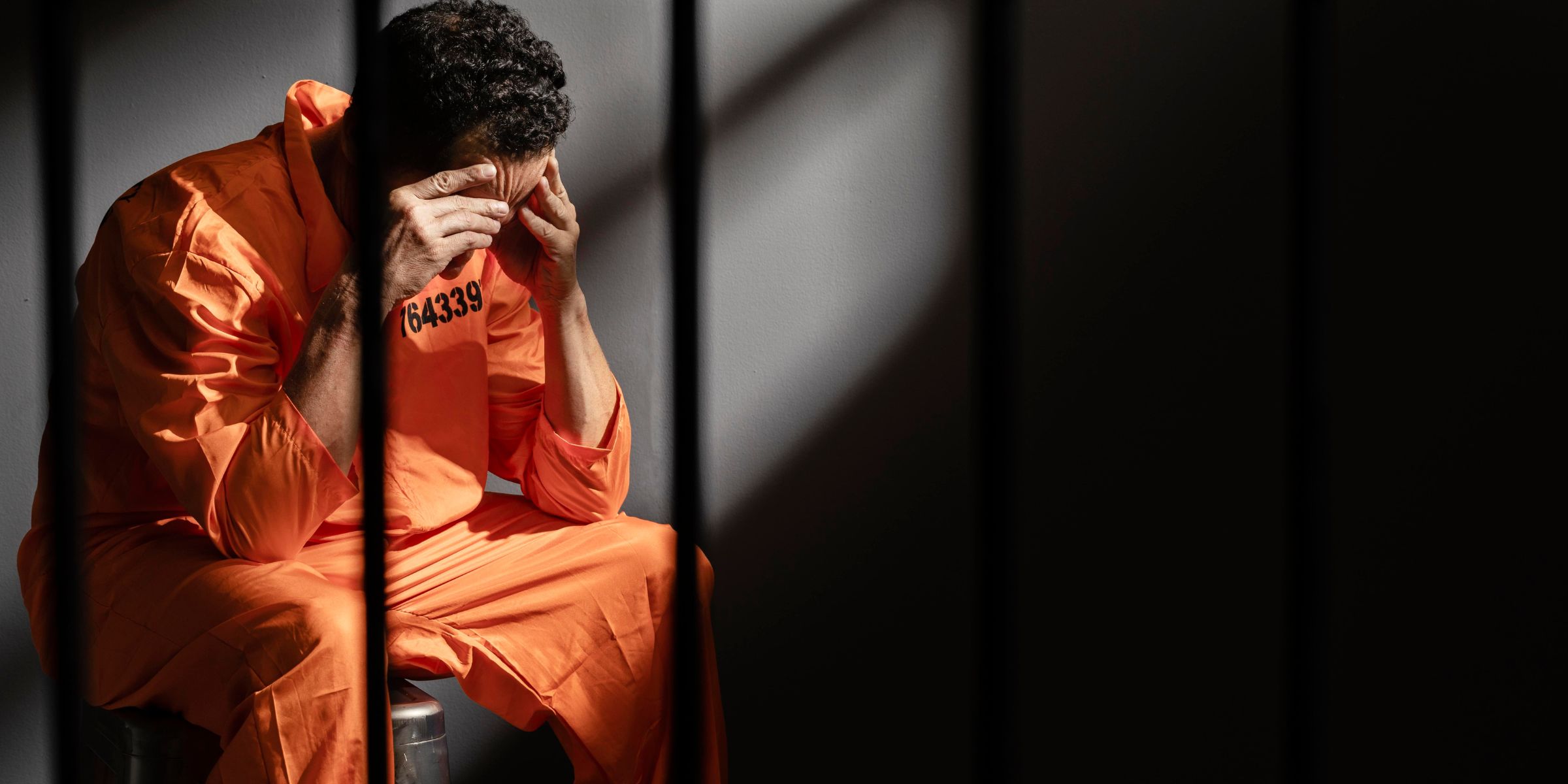 A man sitting in prison | Source: No source