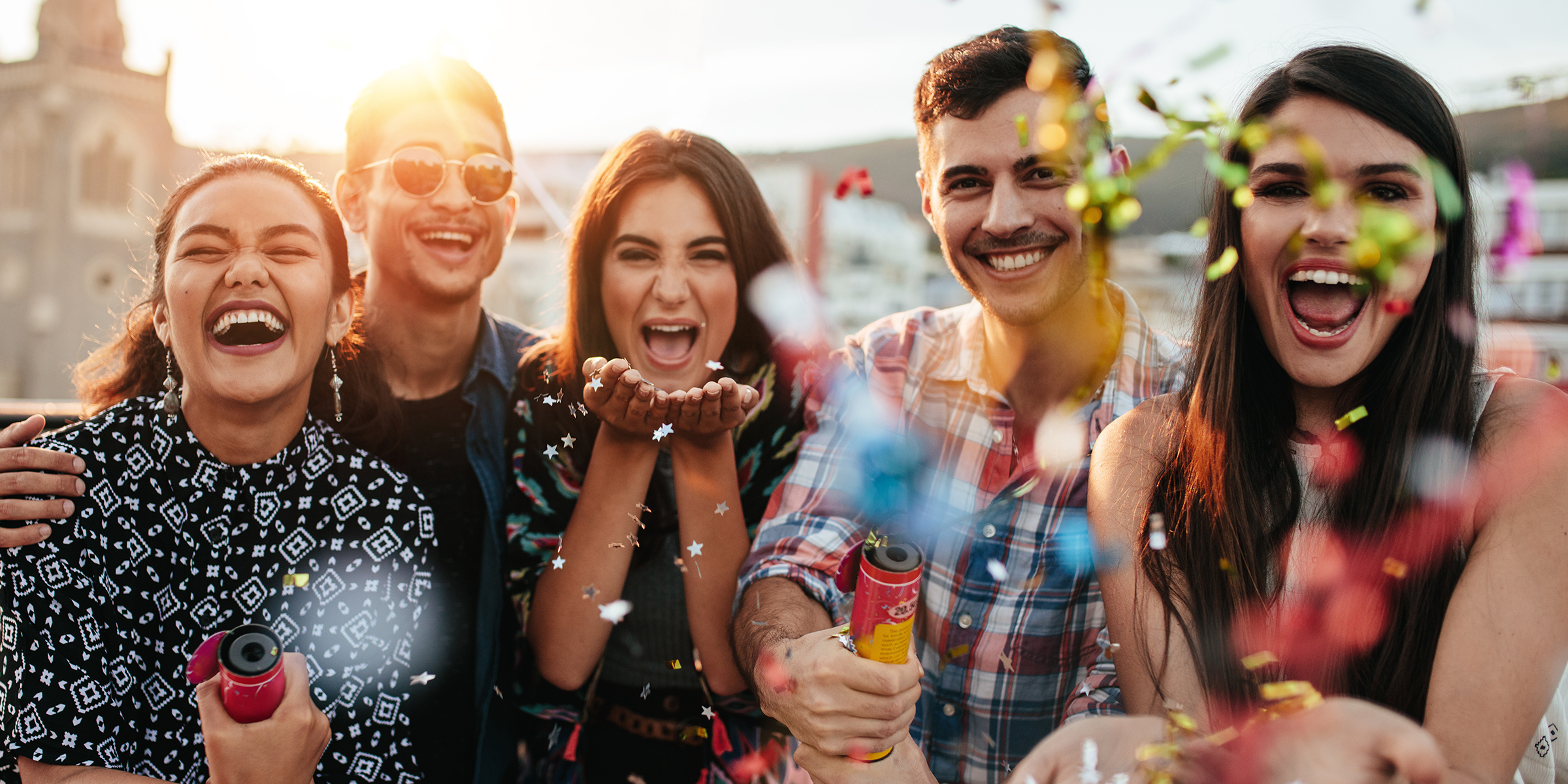 Five people celebrating together | Source: Shutterstock