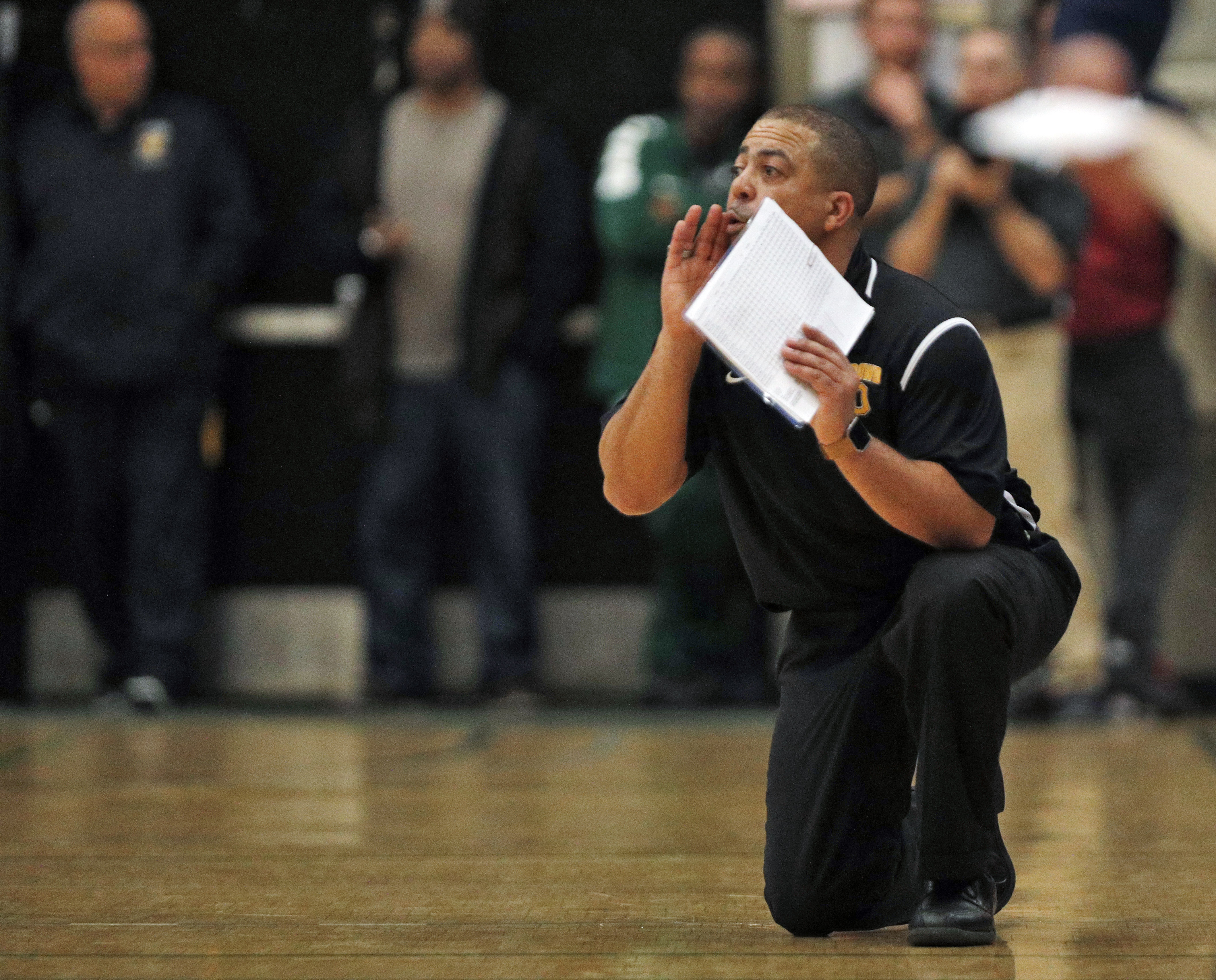 Lou Richie calls out a play in the first half as the Bishop O'Dowd Dragons played the Modesto Christian Crusaders at Laney College in Oakland, California on March 13, 2018. | Source: Getty Images