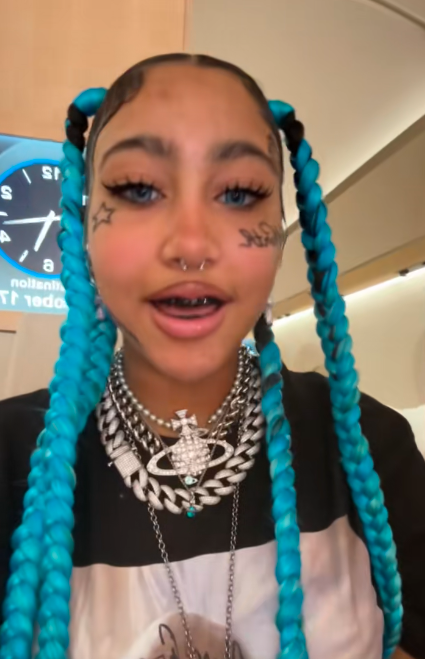 North West lip-syncing to a song while dressed in her striking look, posted on October 18, 2025. | Source: TikTok/@kimandnorth