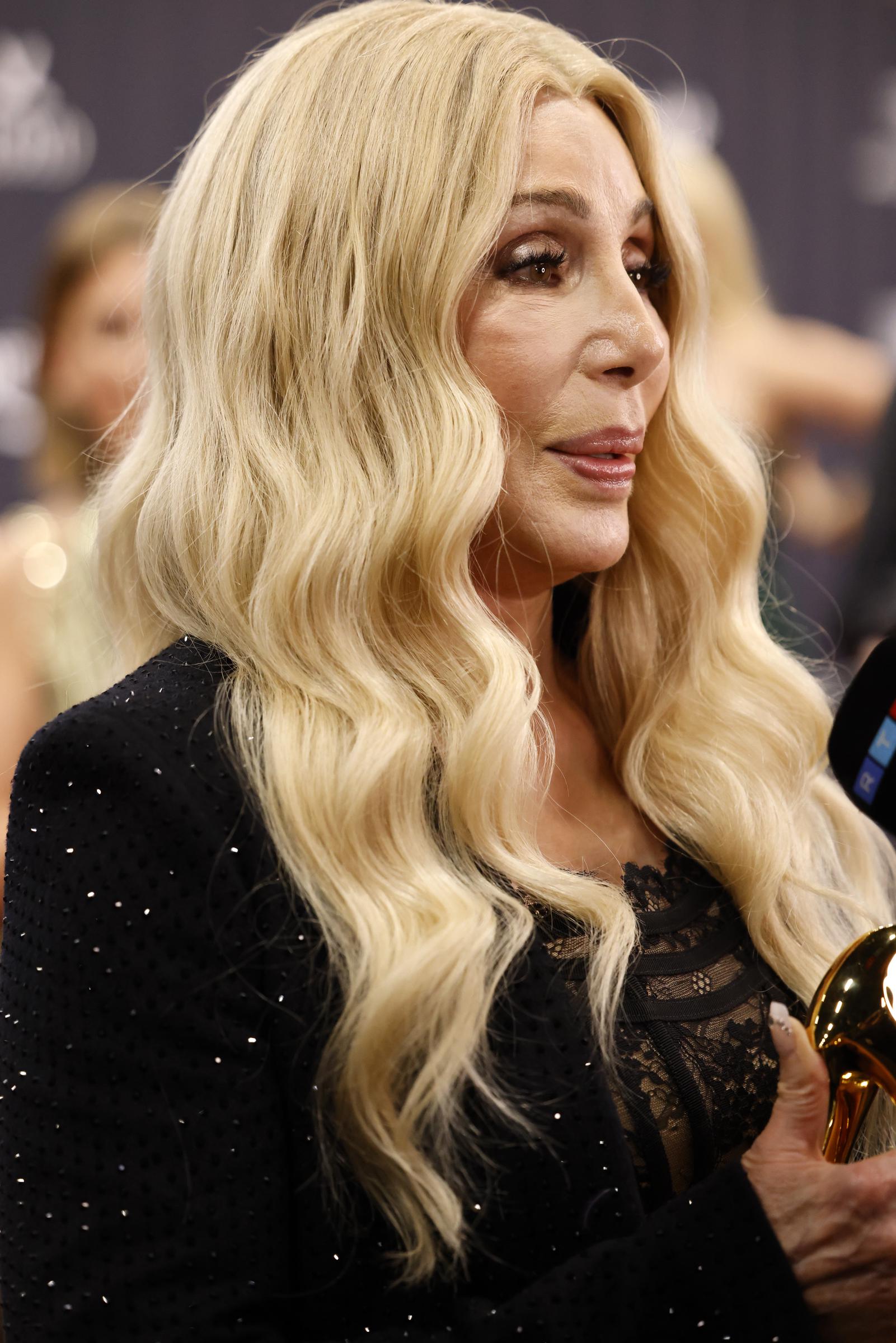 Cher speaking to the press after she received the "Legend" Bambi Award during the Bambi Awards in Munich, Germany on November 13, 2025. | Source: Getty Images